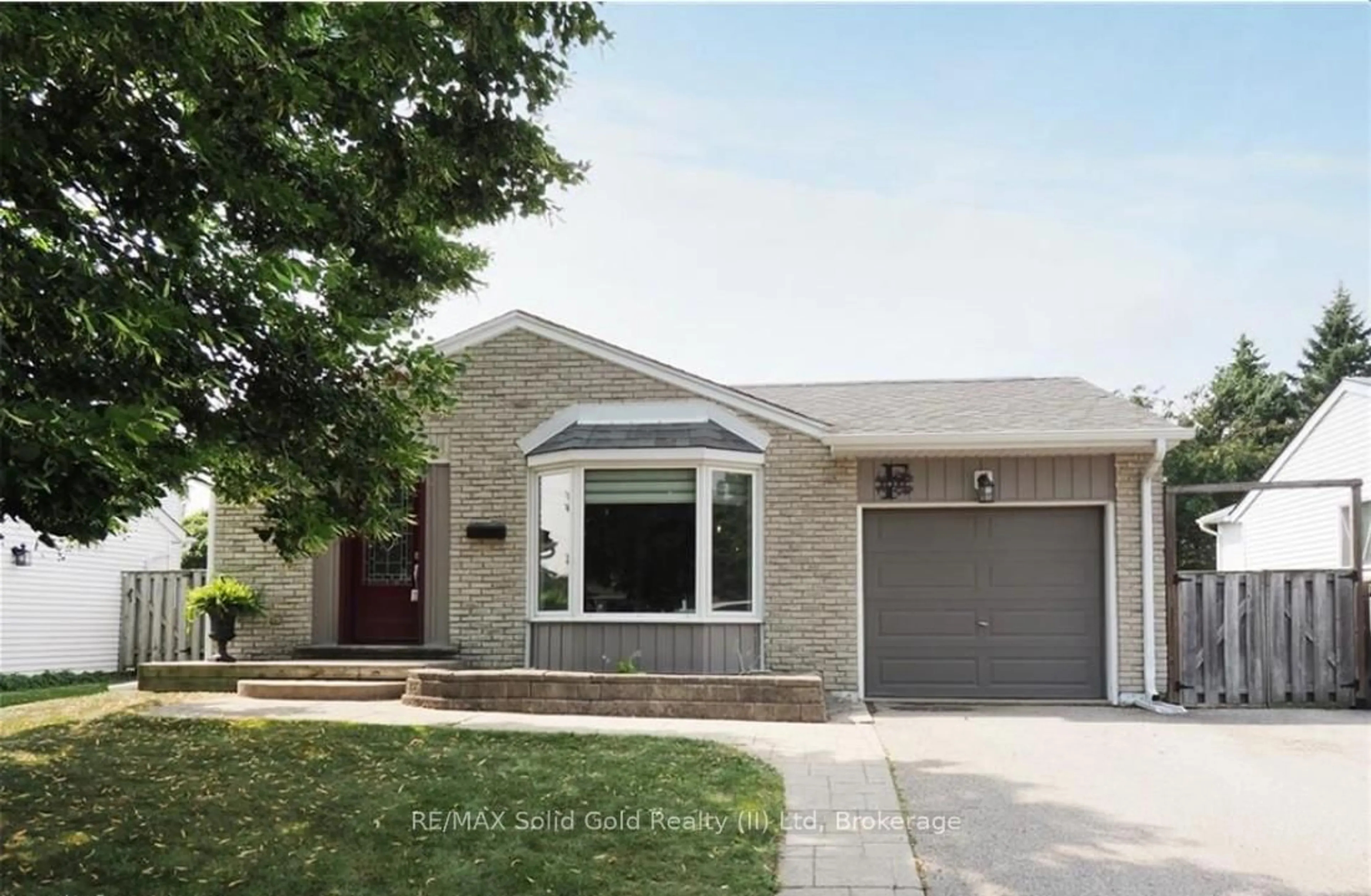 Home with brick exterior material, street for 462 Driftwood Dr, Kitchener Ontario N2N 1S6