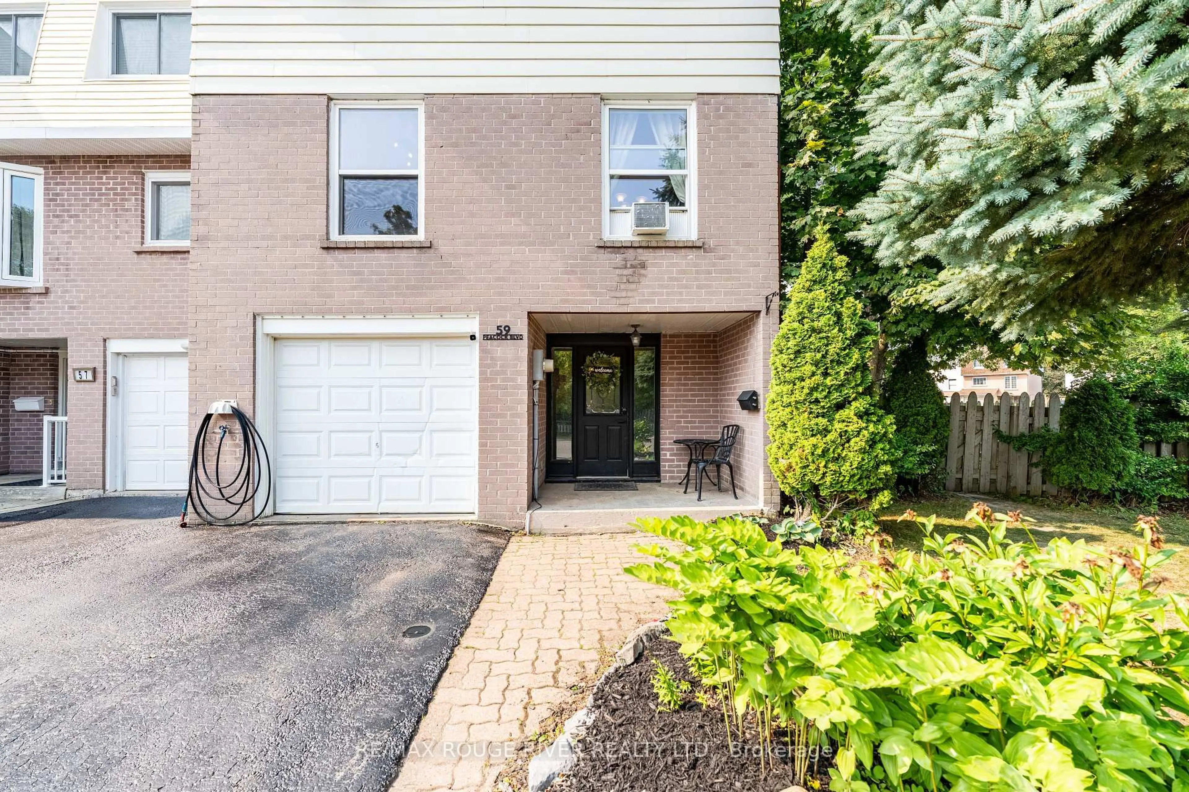 Home with brick exterior material, street for 59 Peacock Blvd, Port Hope Ontario L1A 2X2