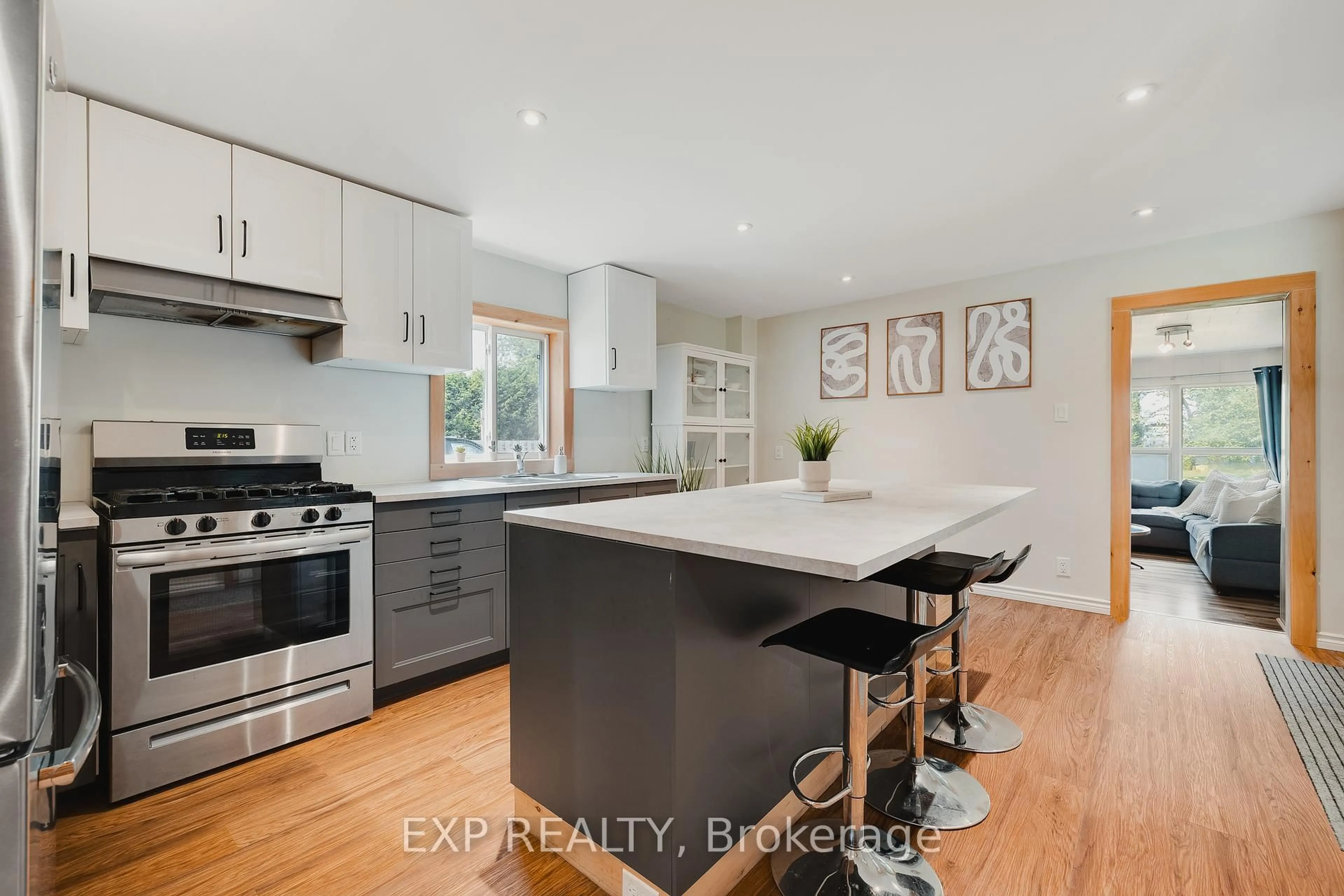 Open concept kitchen, wood/laminate floor for 275 Clayton St, North Perth Ontario N4W 2E9