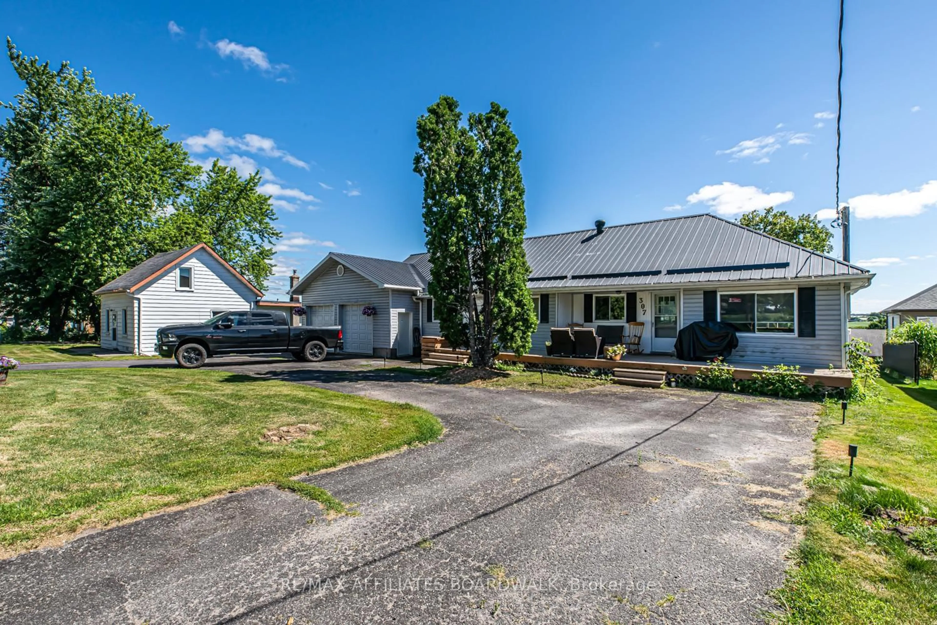 A pic from outside/outdoor area/front of a property/back of a property/a pic from drone, street for 303-307 DONALD B MUNRO Dr, Carp Ontario K0A 1L0