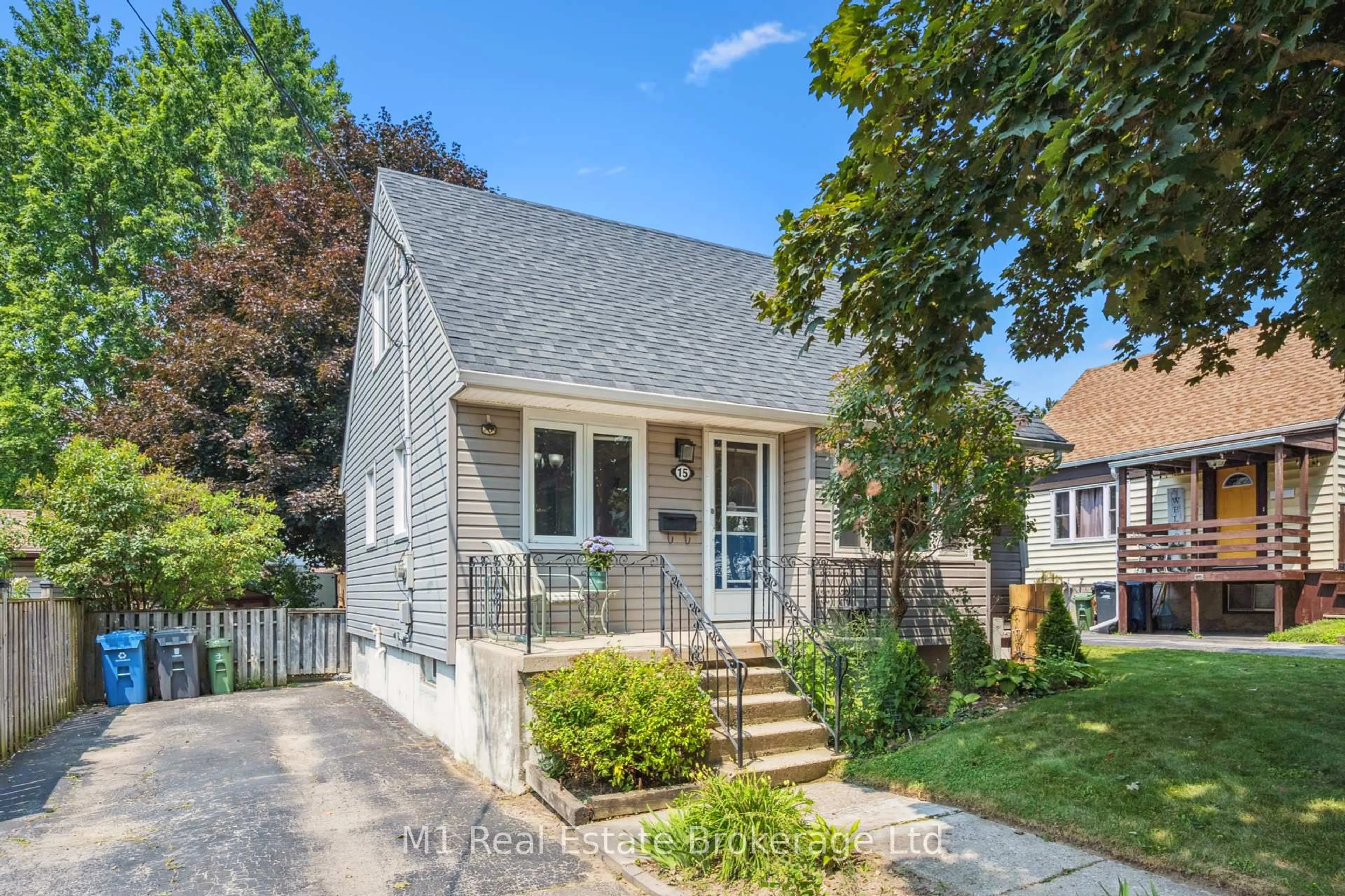 Home with vinyl exterior material, street for 15 Gowdy Ave, Guelph Ontario N1H 2K6