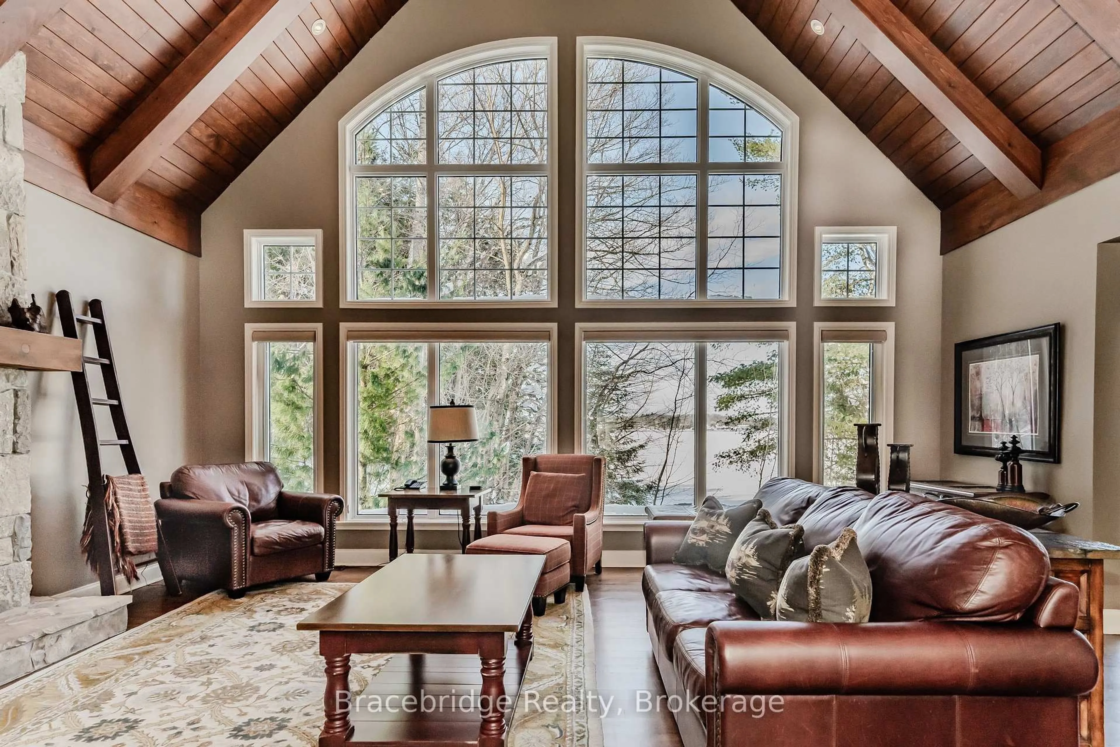 Living room with furniture, unknown for 3876 Muskoka Road 118 Highway #Water's Edge W1, Muskoka Lakes Ontario P0B 1J0