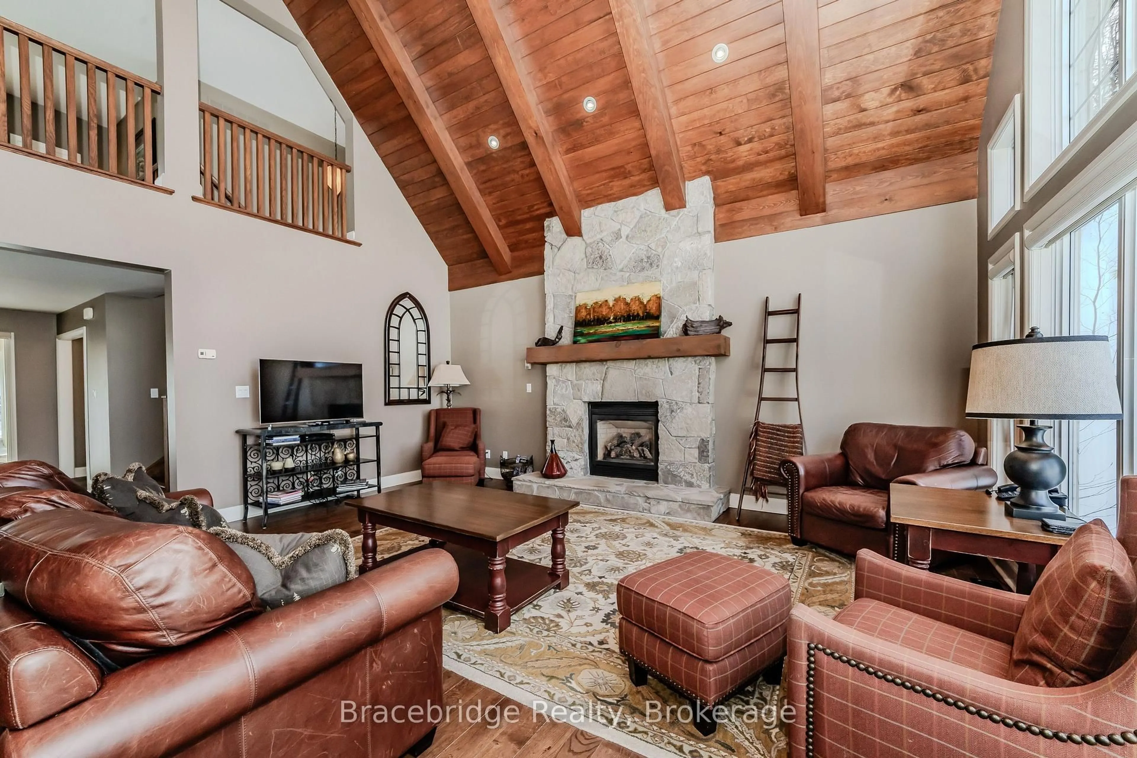 Living room with furniture, unknown for 3876 Muskoka Road 118 Highway #Water's Edge W1, Muskoka Lakes Ontario P0B 1J0