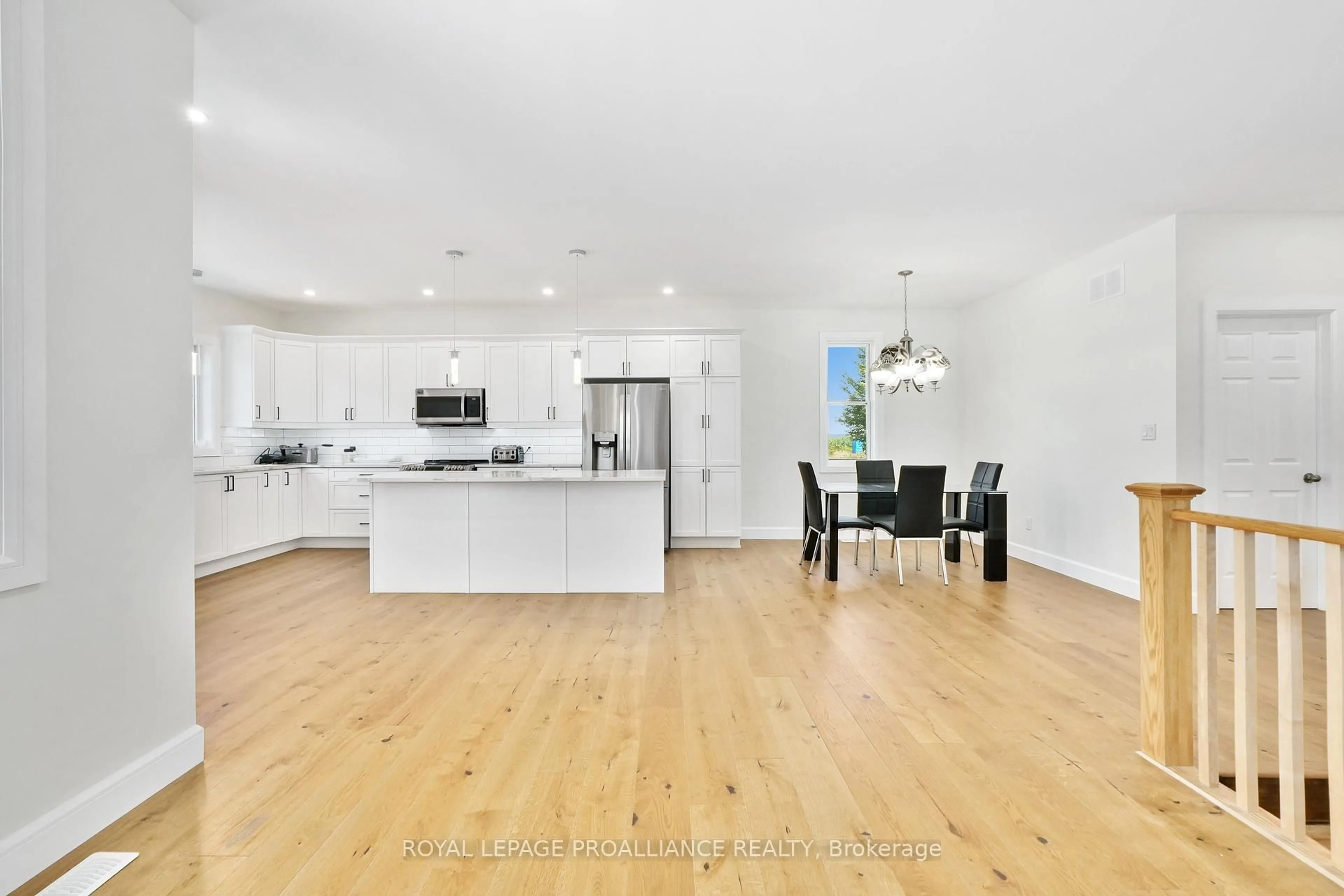 Open concept kitchen, wood/laminate floor for 7717 County Rd 45, Alnwick/Haldimand Ontario K0K 2X0