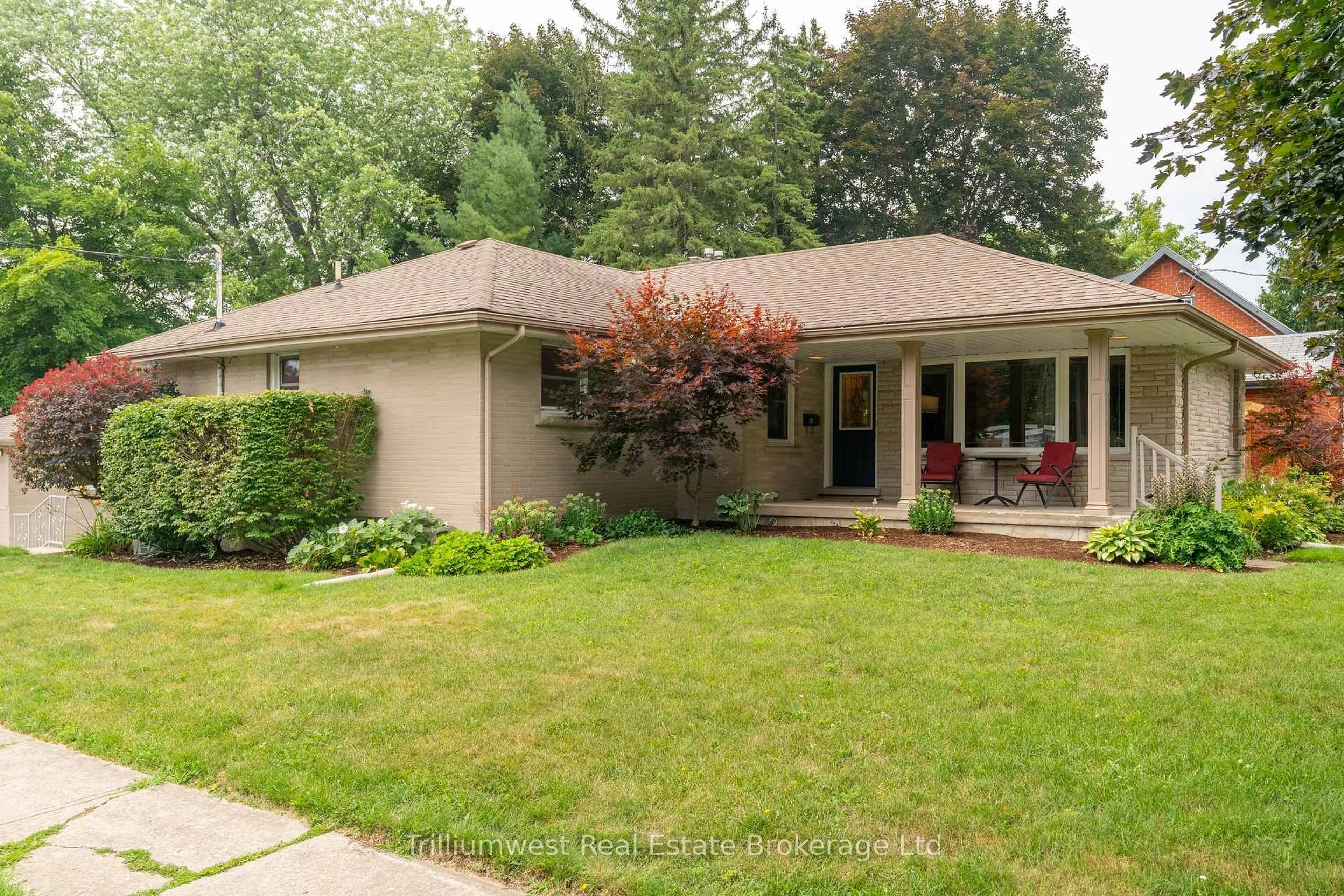 Home with brick exterior material, street for 32 Elginfield Dr, Guelph Ontario N1E 4E7