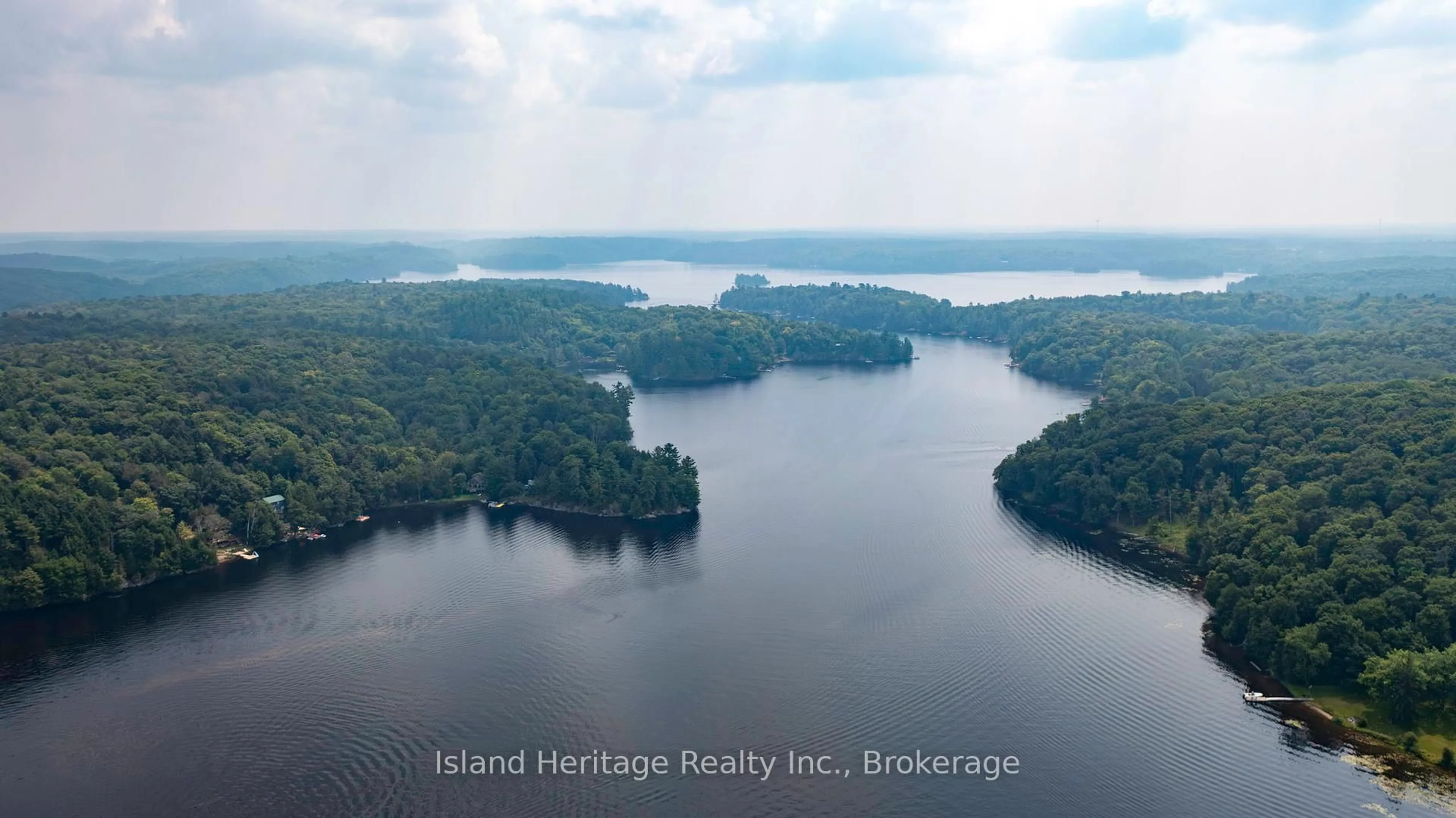 A pic from outside/outdoor area/front of a property/back of a property/a pic from drone, water/lake/river/ocean view for 5 Linney Lane, McDougall Ontario P2A 2W9