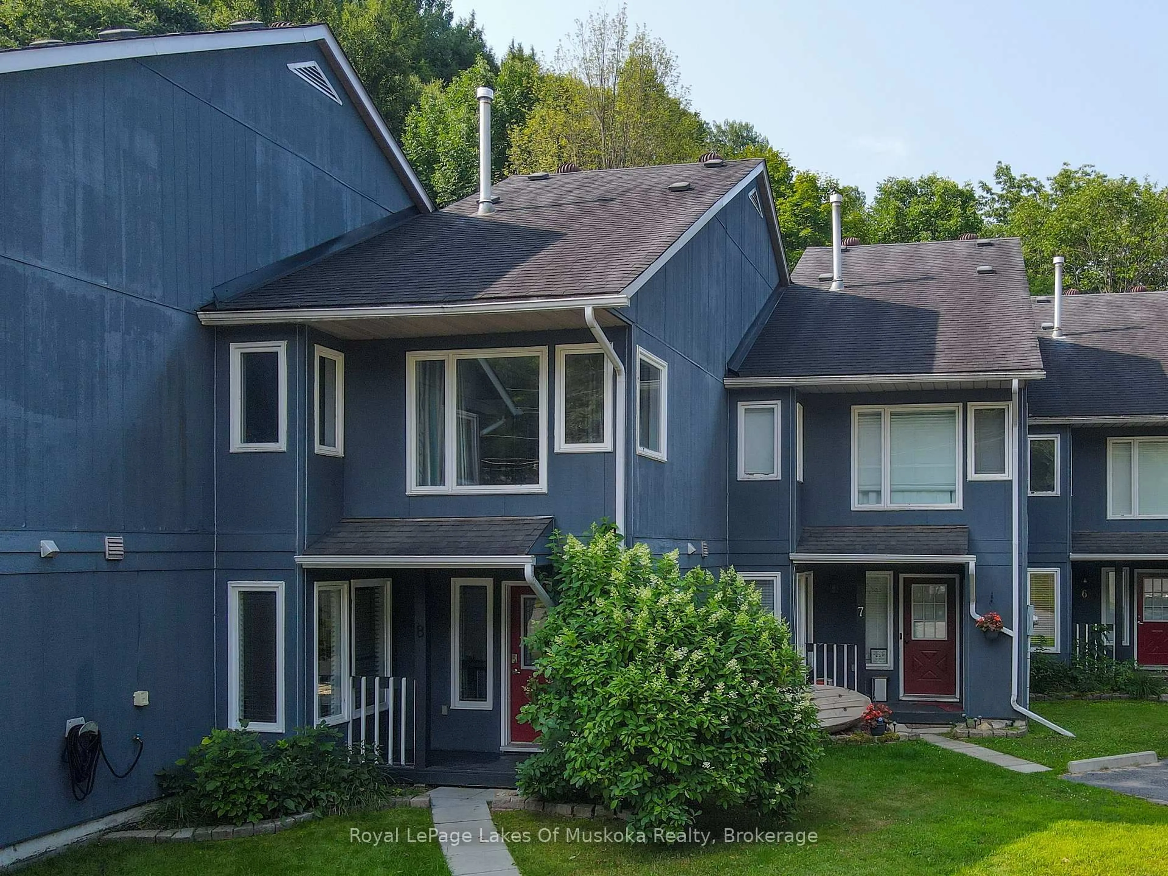 Home with vinyl exterior material, street for 1561 Hidden Valley Rd #8, Huntsville Ontario P1H 1A4
