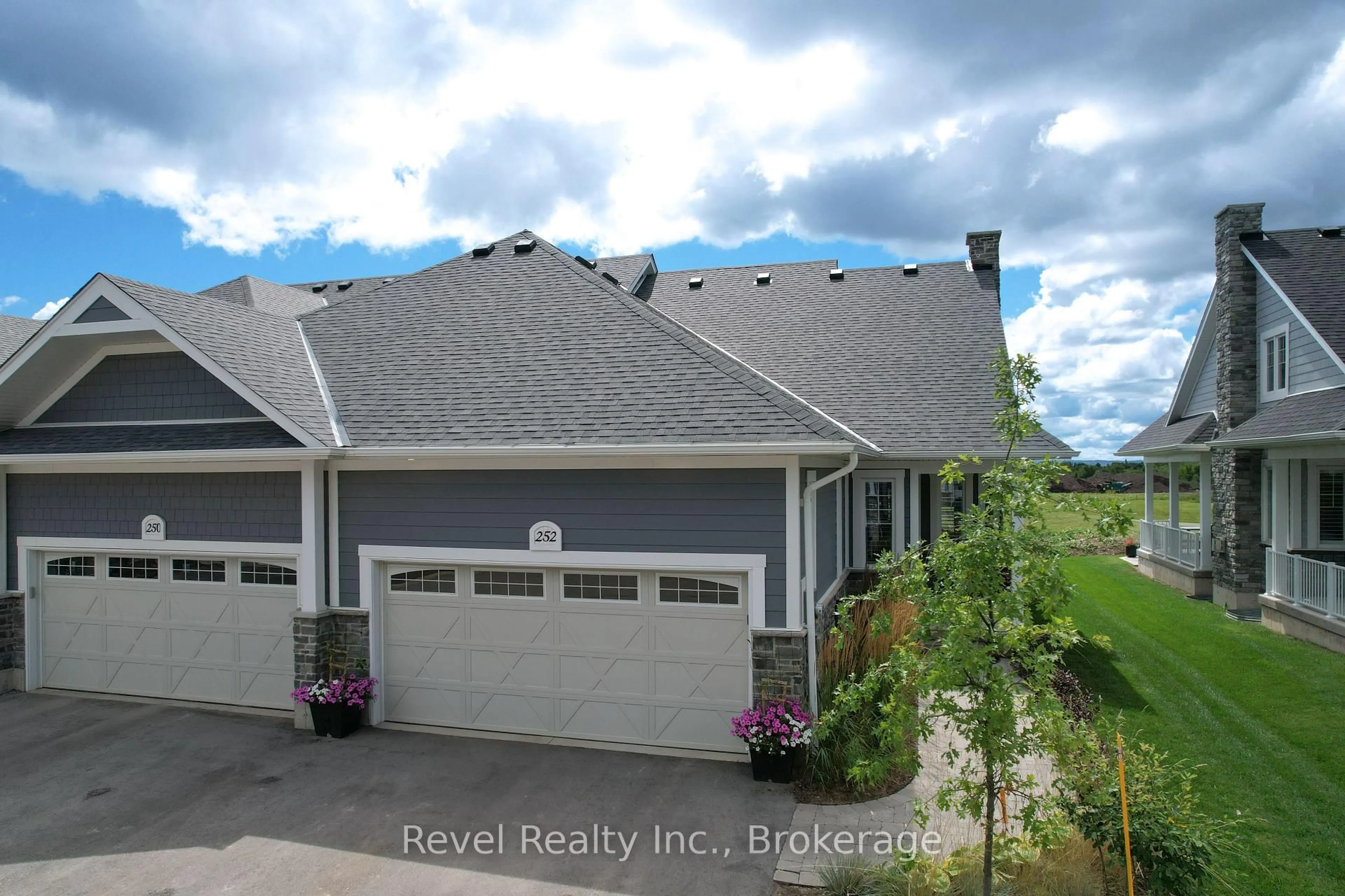 A pic from outside/outdoor area/front of a property/back of a property/a pic from drone, street for 252 Ironwood Way, Georgian Bluffs Ontario N0H 1S0