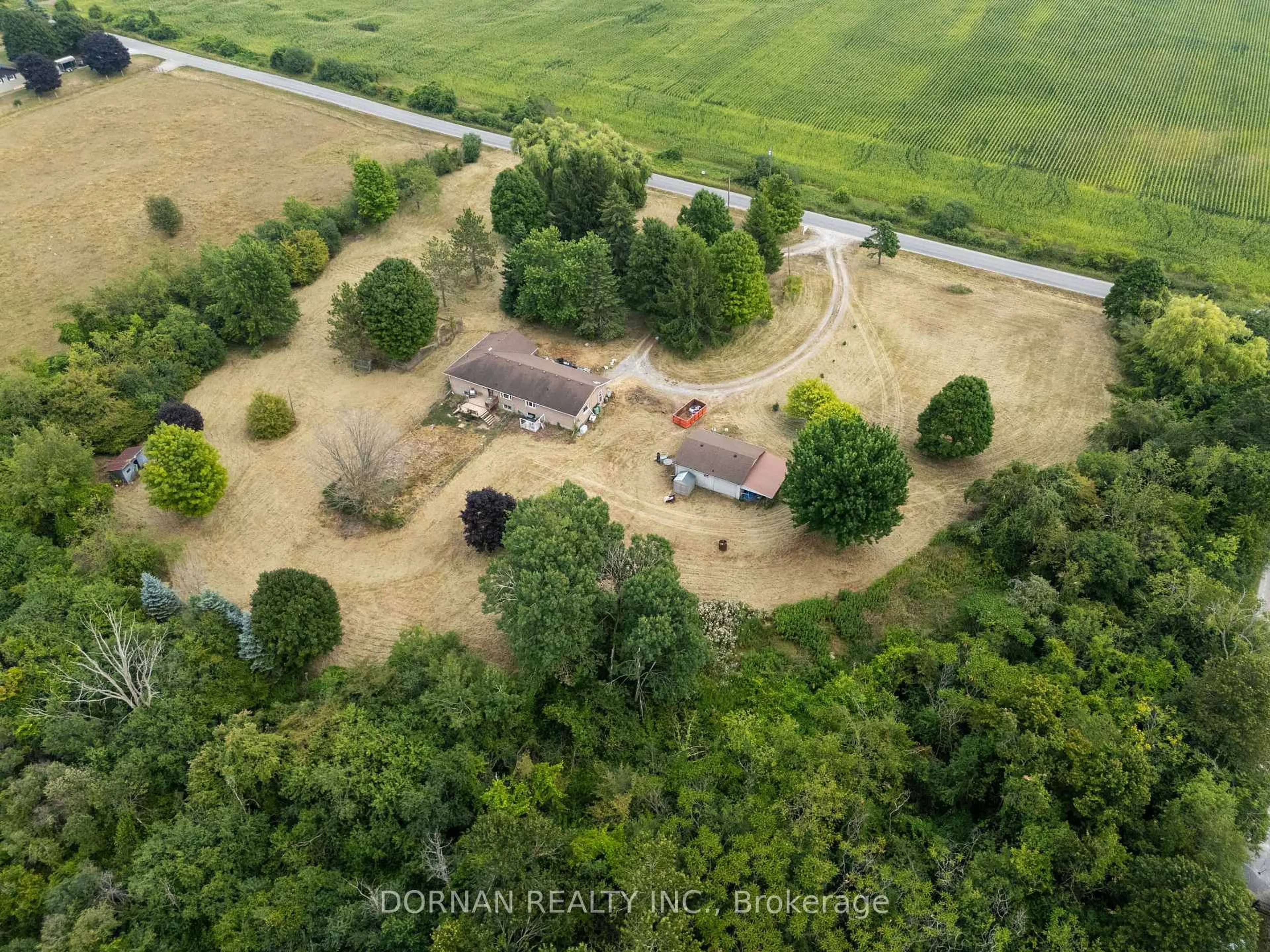 A pic from outside/outdoor area/front of a property/back of a property/a pic from drone, forest/trees view for 5858 Eagleson Line, Cavan Monaghan Ontario L0A 1G0