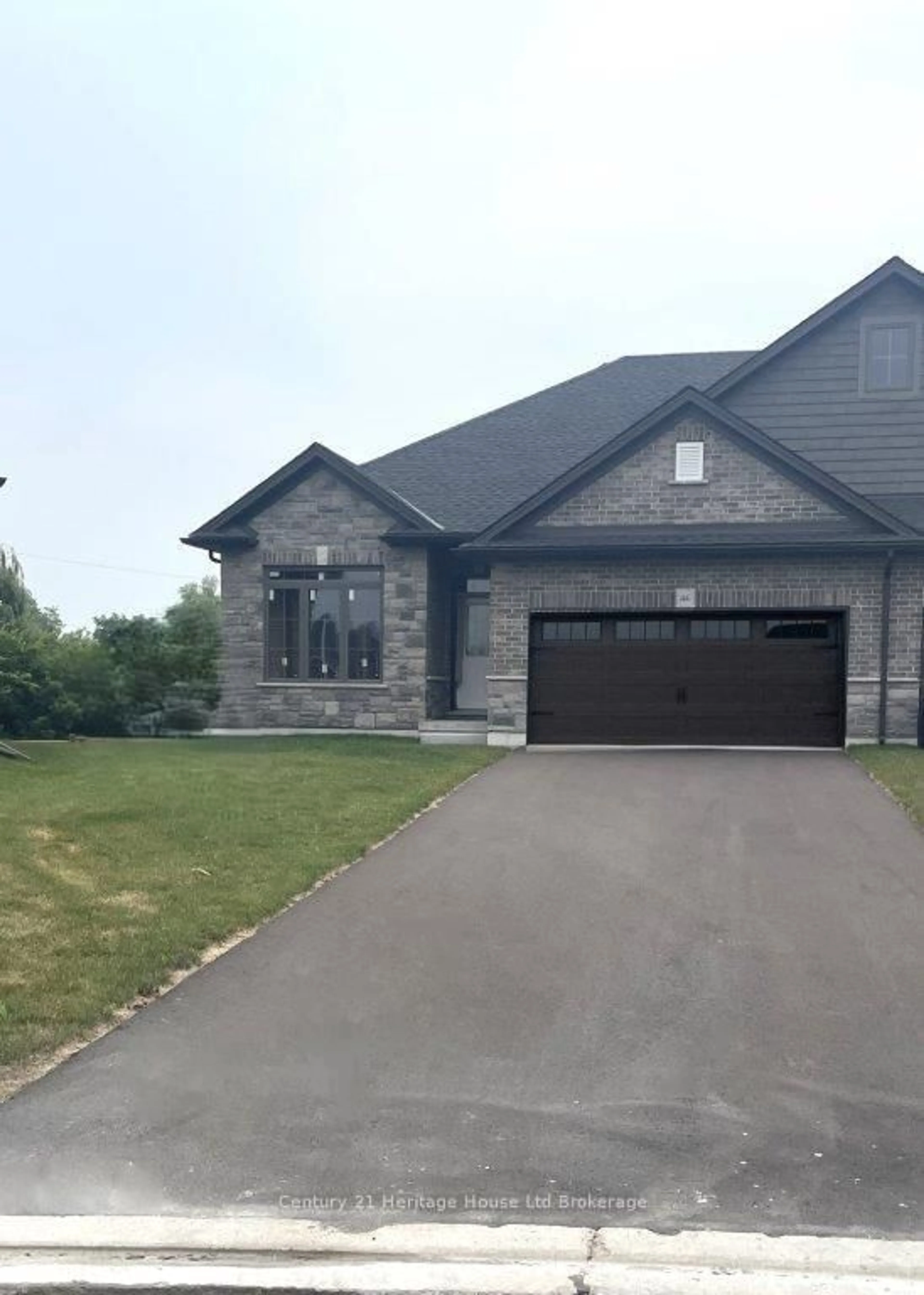 Home with brick exterior material, street for 46 MATHESON Cres, East Zorra-Tavistock Ontario N0J 1M0