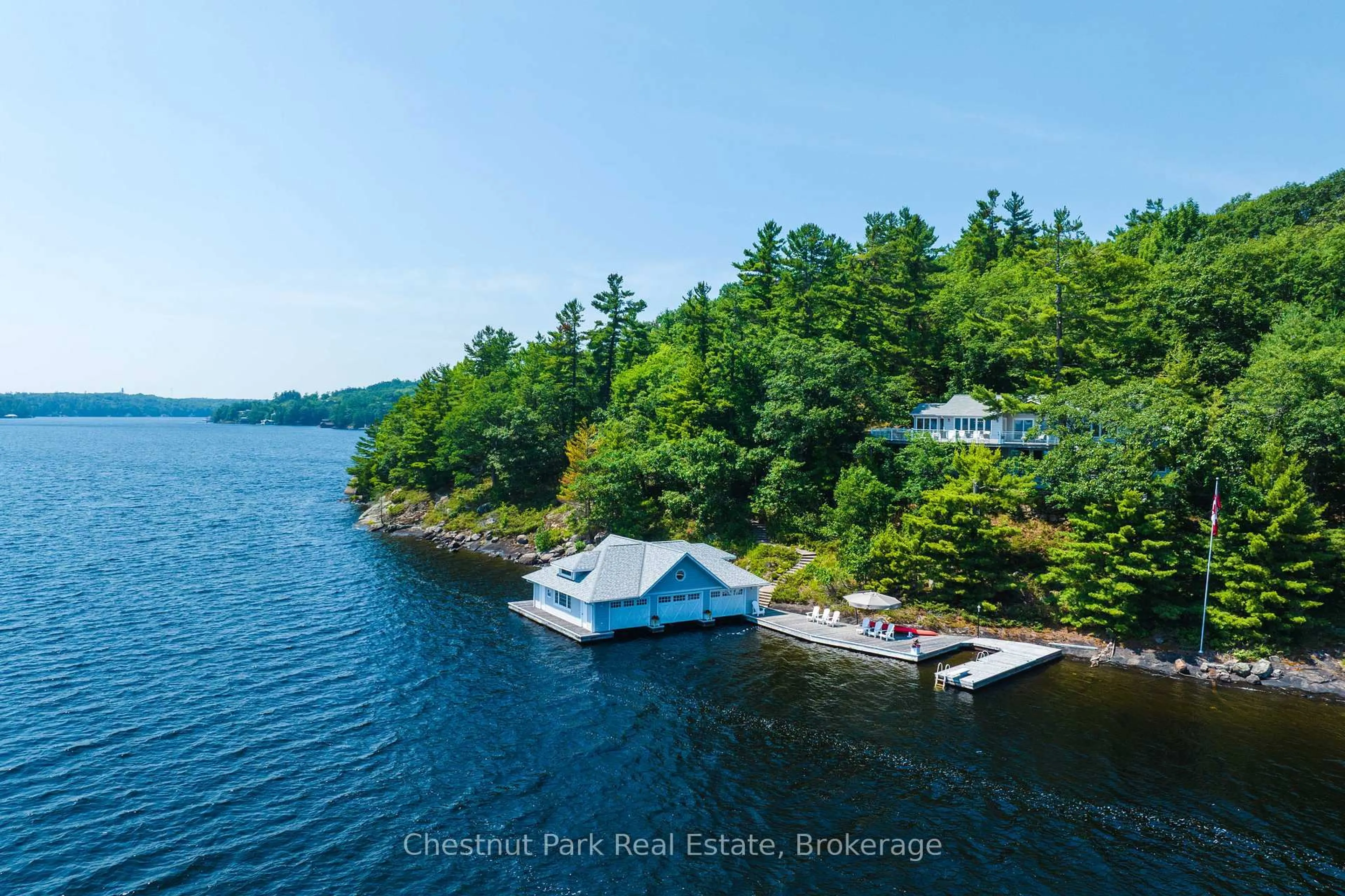 A pic from outside/outdoor area/front of a property/back of a property/a pic from drone, water/lake/river/ocean view for 1121 Scarcliffe Rd #14, Muskoka Lakes Ontario P0B 1J0