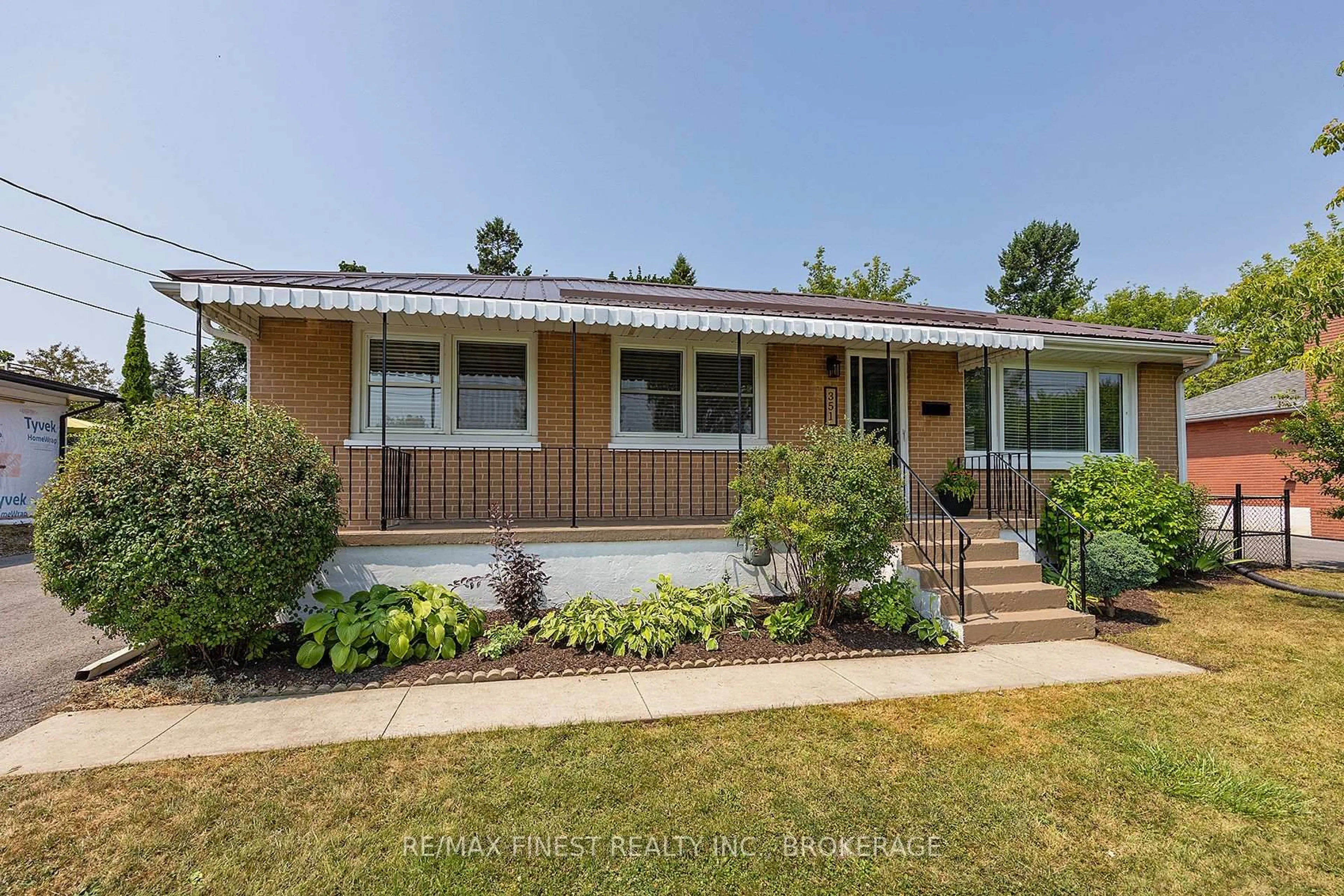 Home with vinyl exterior material, street for 351 Days Rd, Kingston Ontario K7M 3R5