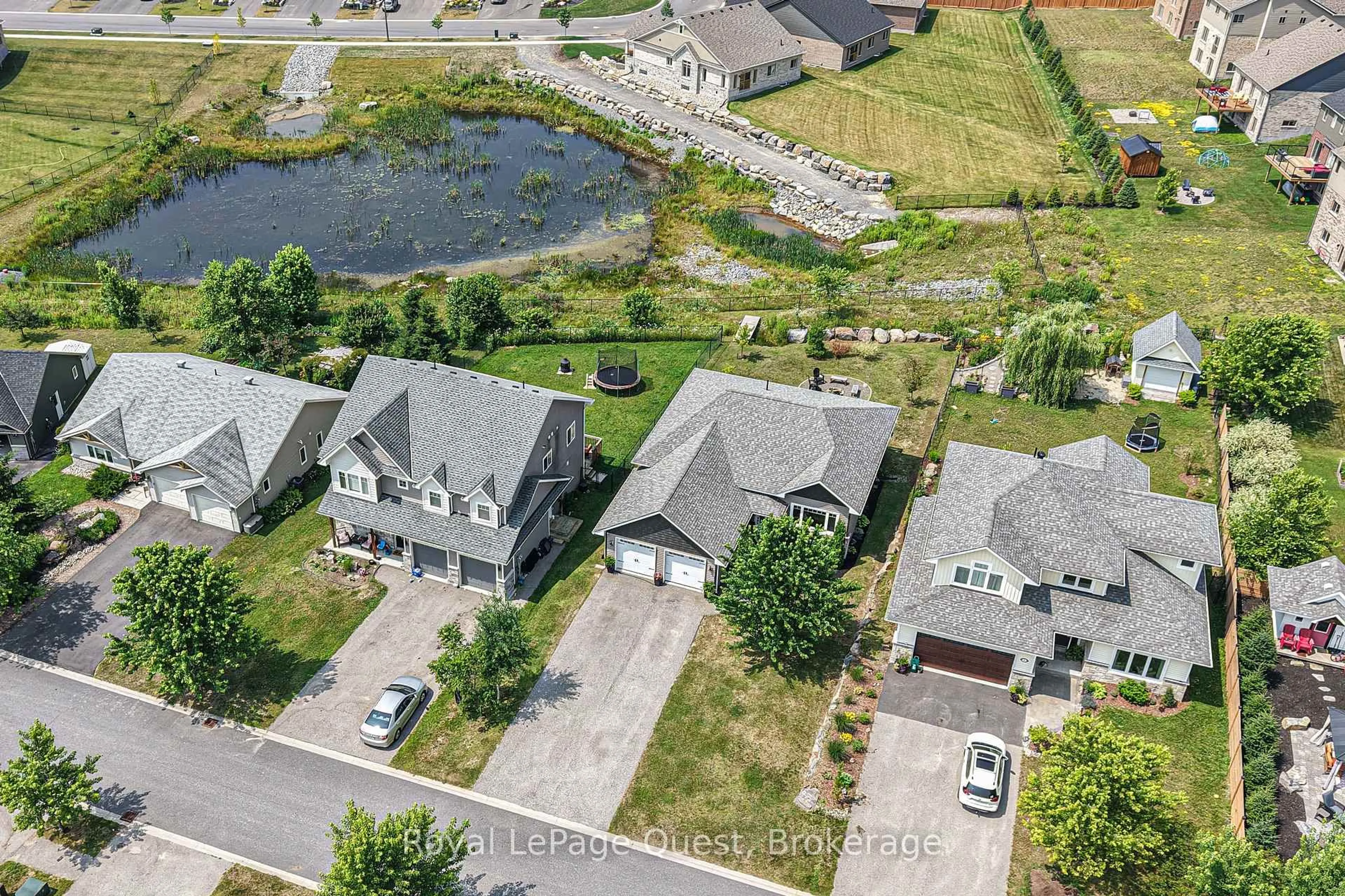 A pic from outside/outdoor area/front of a property/back of a property/a pic from drone, water/lake/river/ocean view for 6 Millwood Crt, Huntsville Ontario P1H 1E1