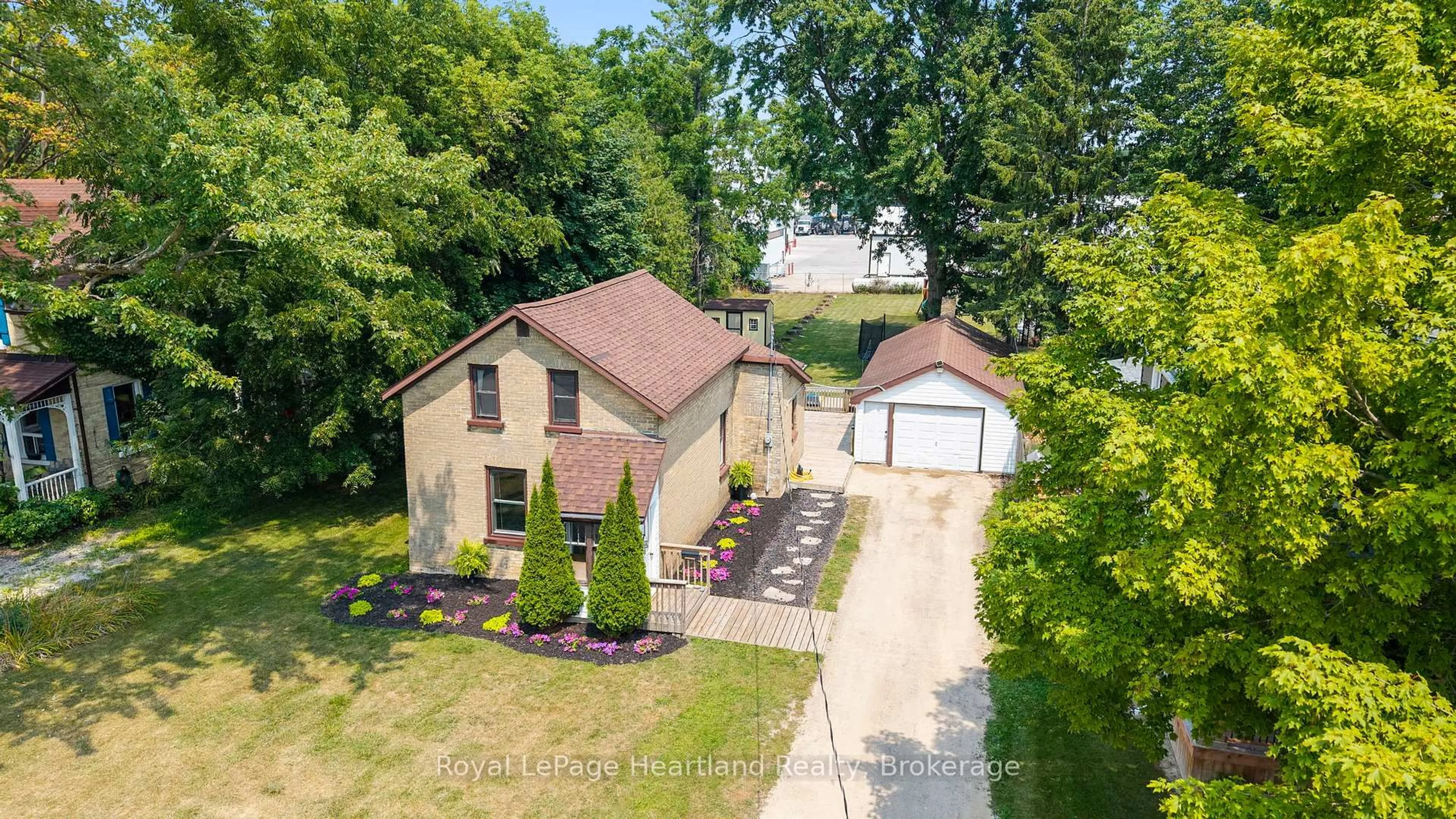 A pic from outside/outdoor area/front of a property/back of a property/a pic from drone, street for 67 ROBERTSON St, Minto Ontario N0G 1Z0