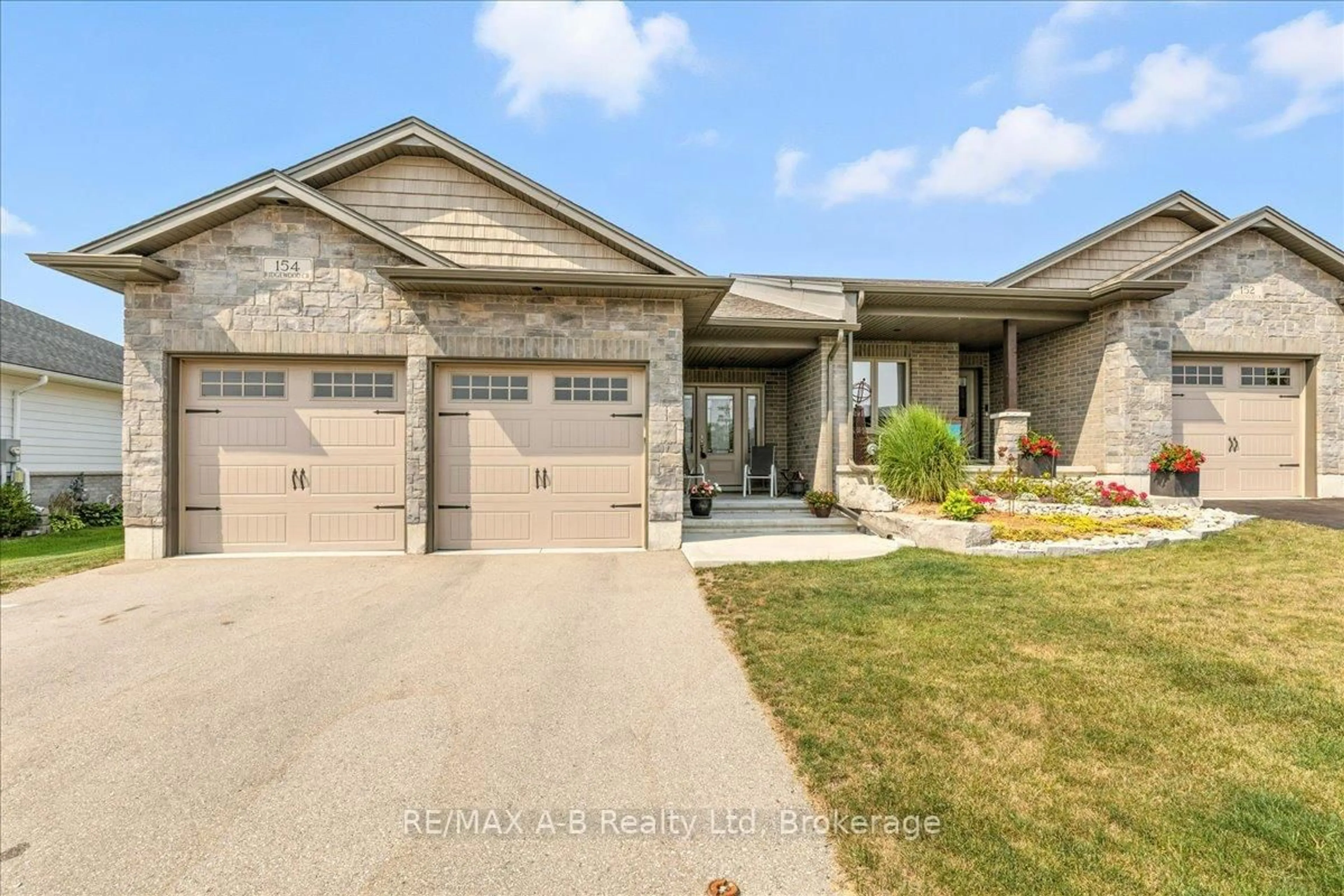 Home with brick exterior material, street for 154 Ridgewood Cres, St. Marys Ontario N4X 1E8
