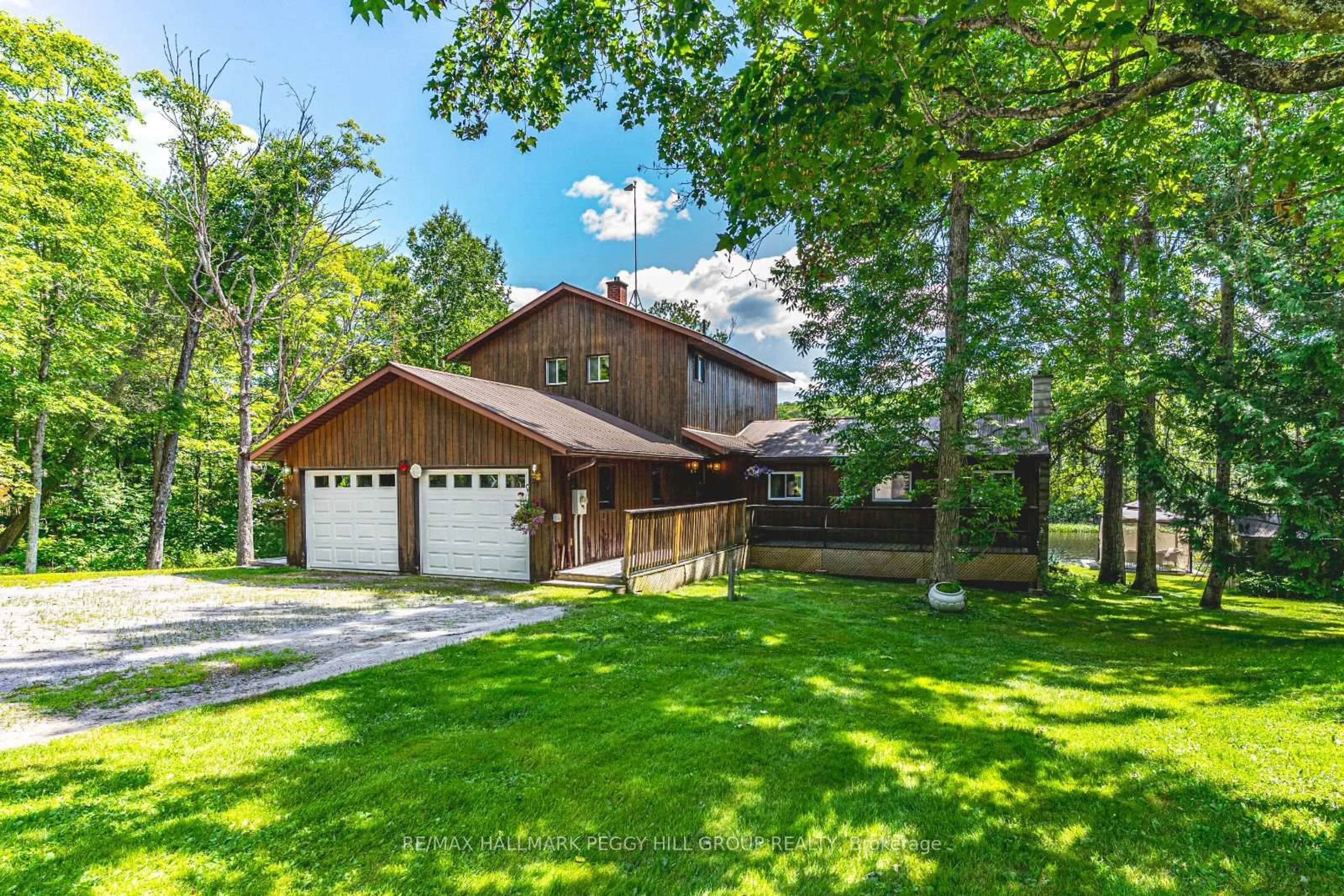 A pic from outside/outdoor area/front of a property/back of a property/a pic from drone, unknown for 483 Spring Hill Rd, Ryerson Ontario P0A 1C0