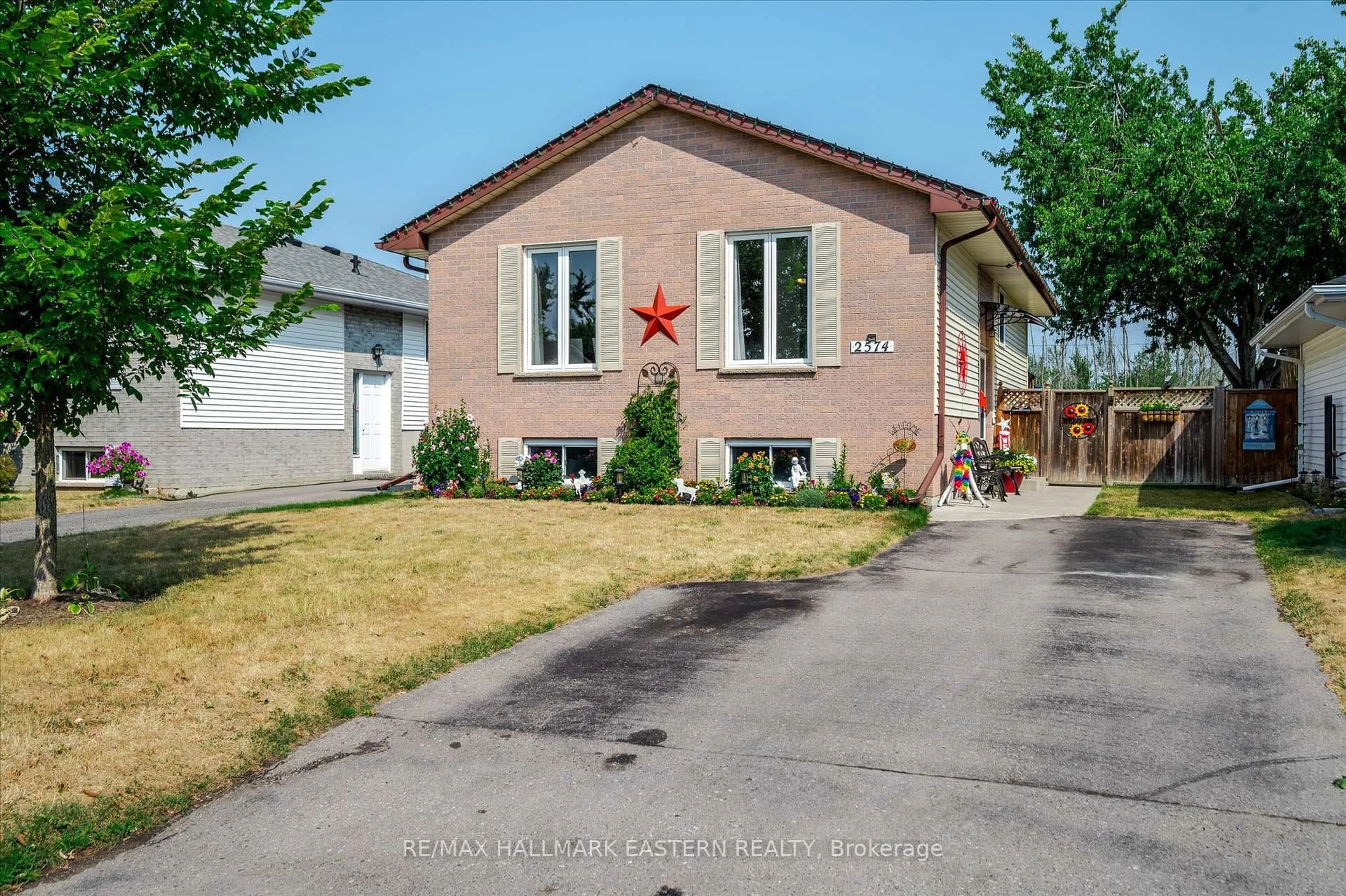 Home with brick exterior material, street for 2574 Foxmeadow Rd, Peterborough East Ontario K9L 1X2
