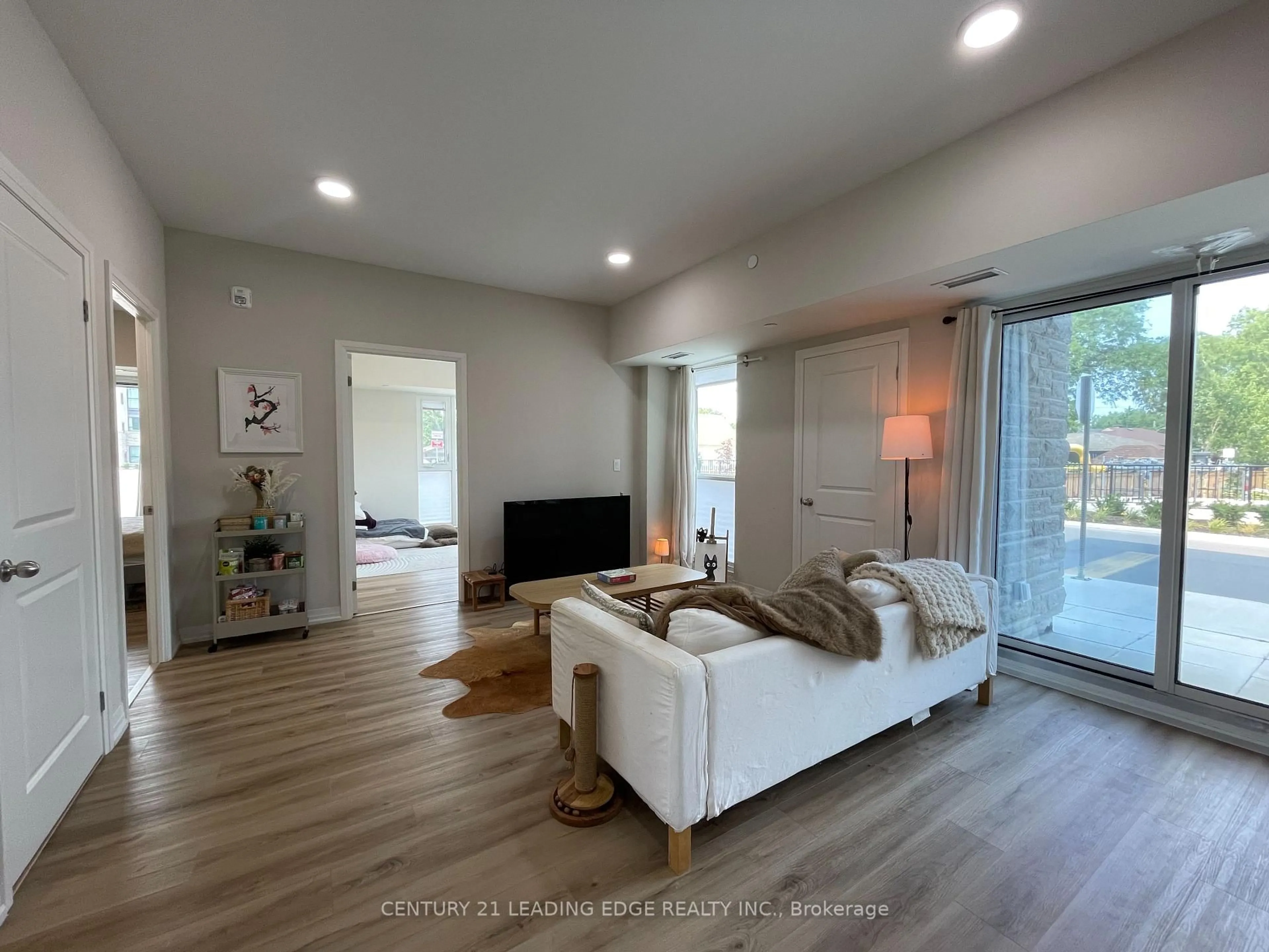 Living room with furniture, unknown for 50 Herrick Ave ##115, St. Catharines Ontario L2P 2T9