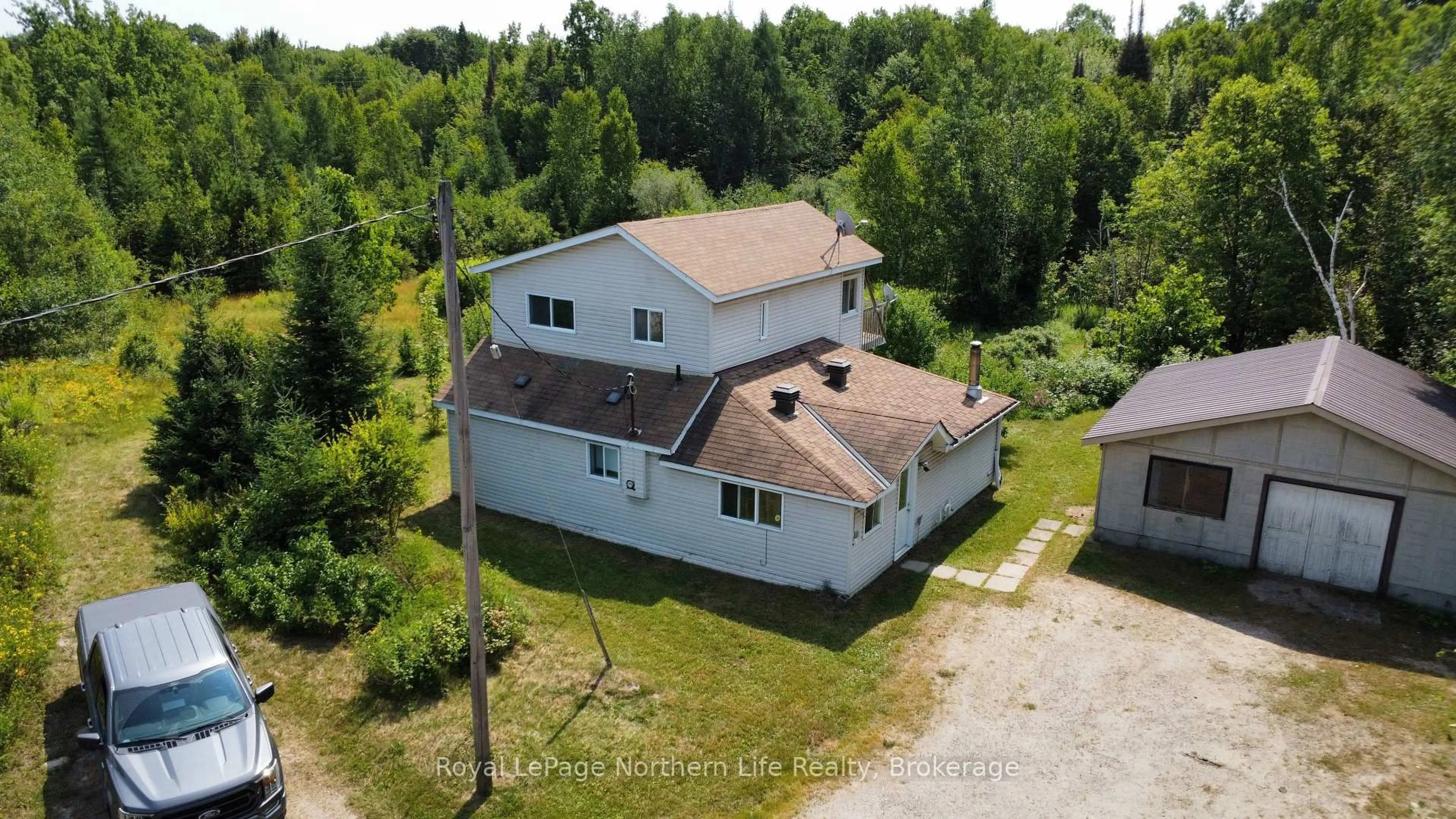 A pic from outside/outdoor area/front of a property/back of a property/a pic from drone, building for 202 Highway 17, Bonfield Ontario P1B 8G4