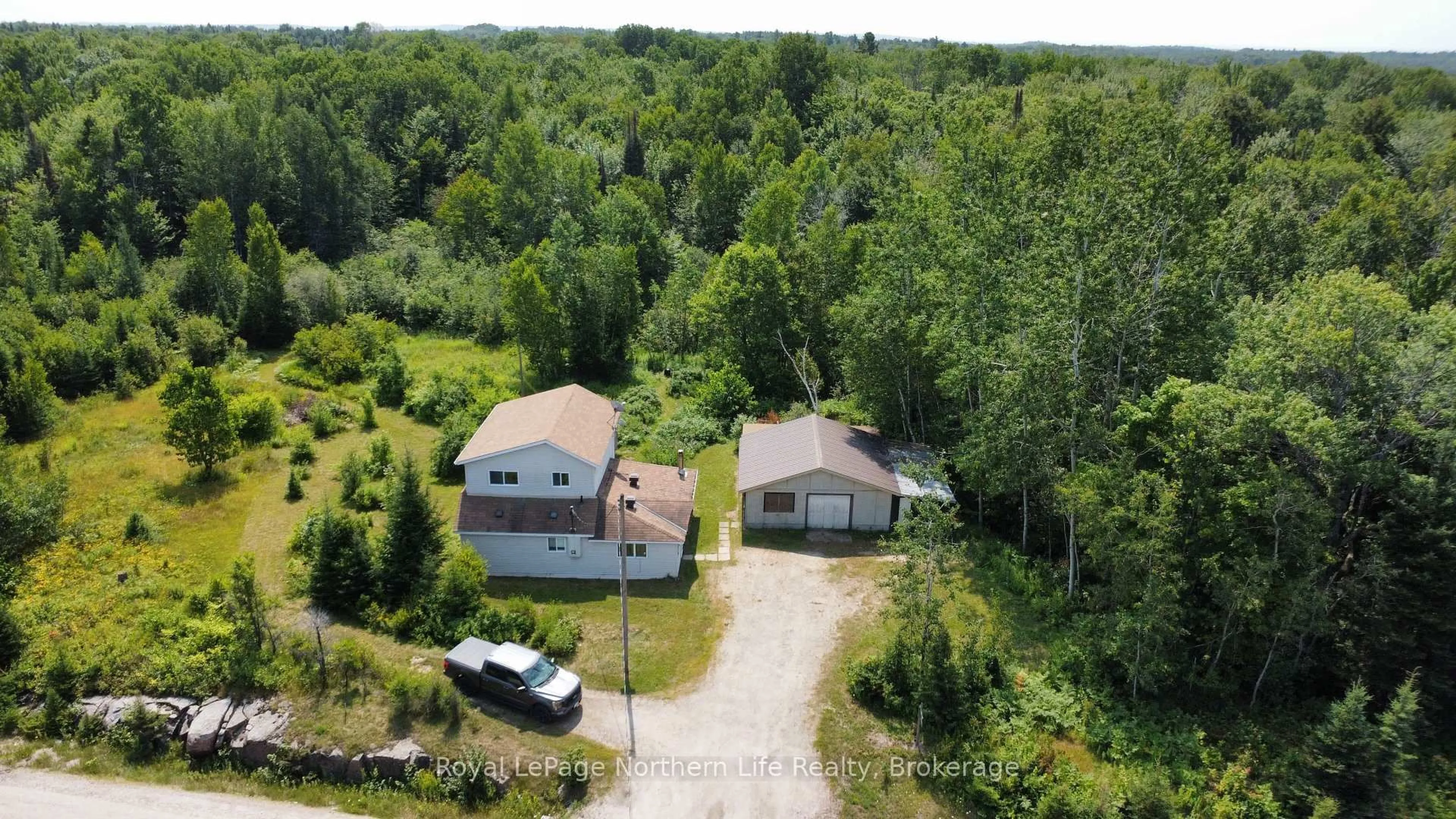 A pic from outside/outdoor area/front of a property/back of a property/a pic from drone, unknown for 202 Highway 17, Bonfield Ontario P1B 8G4