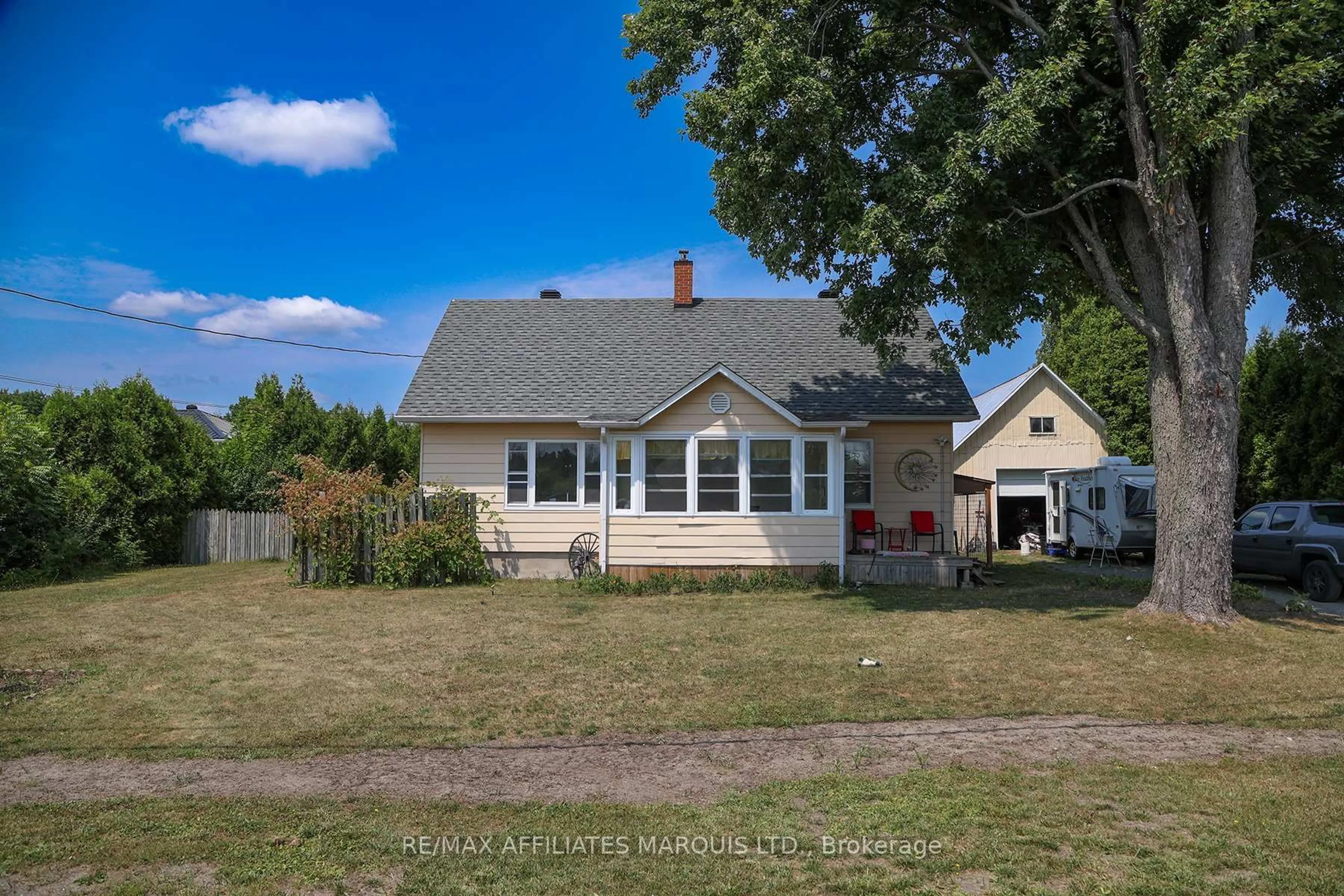 A pic from outside/outdoor area/front of a property/back of a property/a pic from drone, street for 13039 Riverside Dr, South Dundas Ontario K0C 1X0