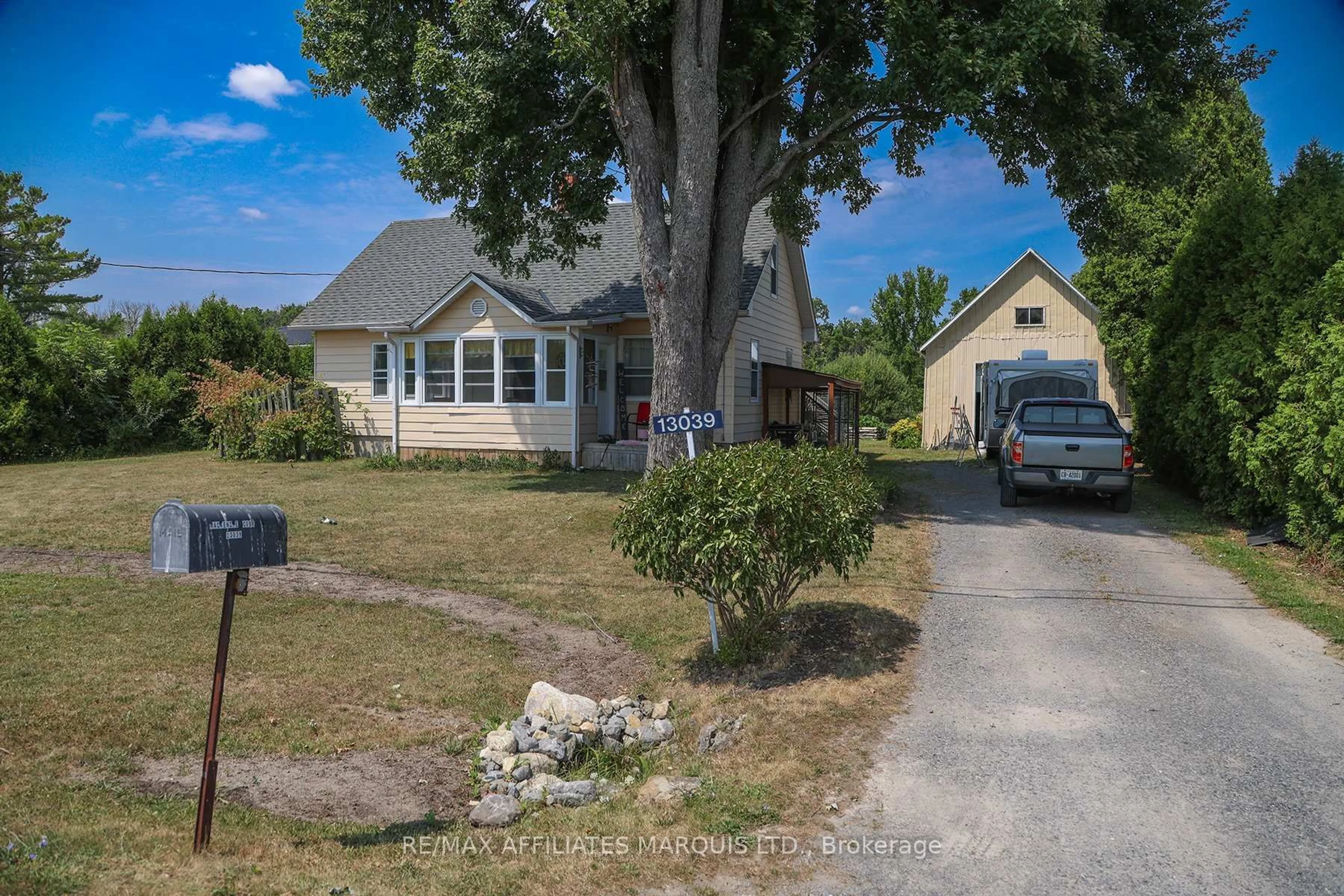 A pic from outside/outdoor area/front of a property/back of a property/a pic from drone, street for 13039 Riverside Dr, South Dundas Ontario K0C 1X0