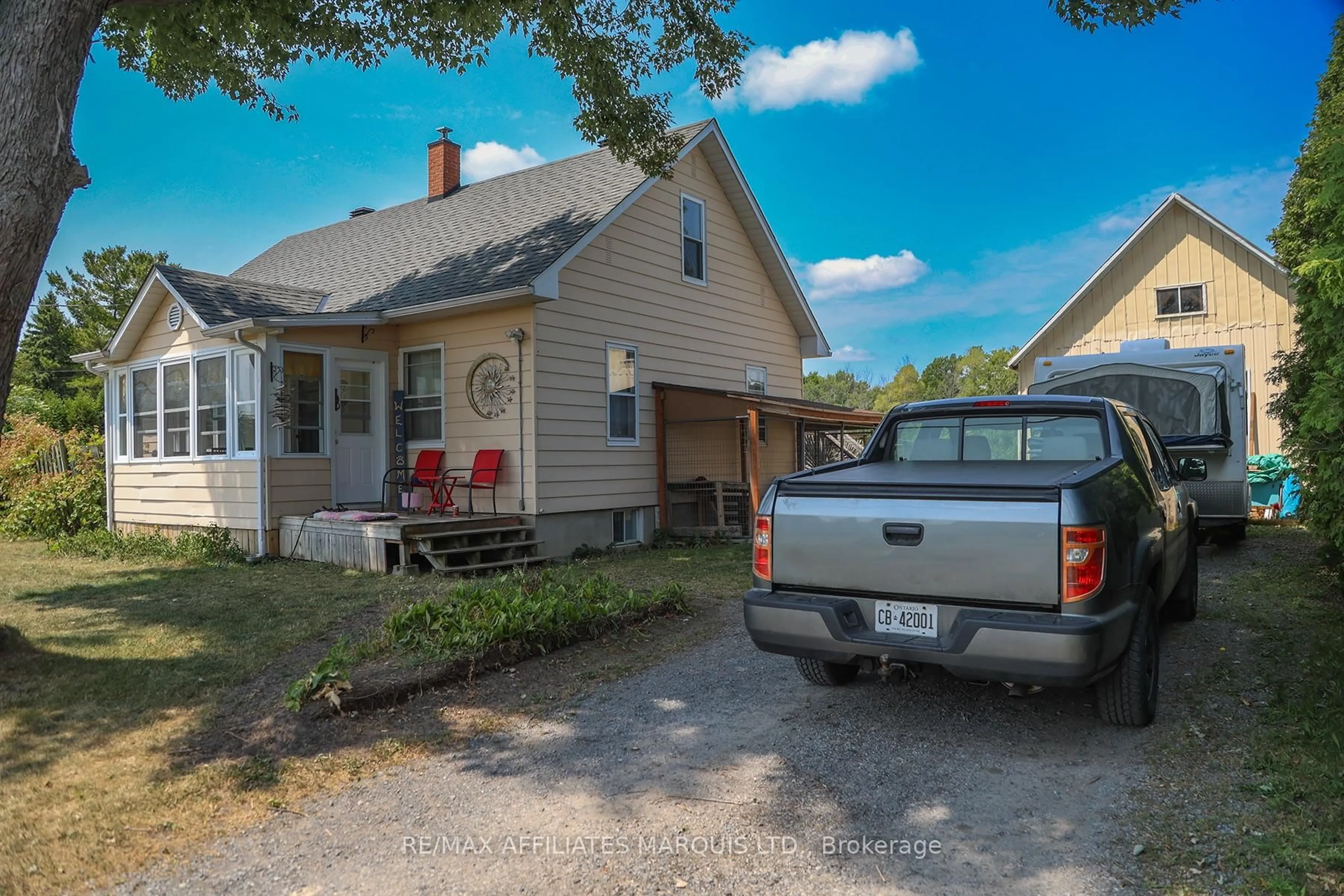 A pic from outside/outdoor area/front of a property/back of a property/a pic from drone, street for 13039 Riverside Dr, South Dundas Ontario K0C 1X0