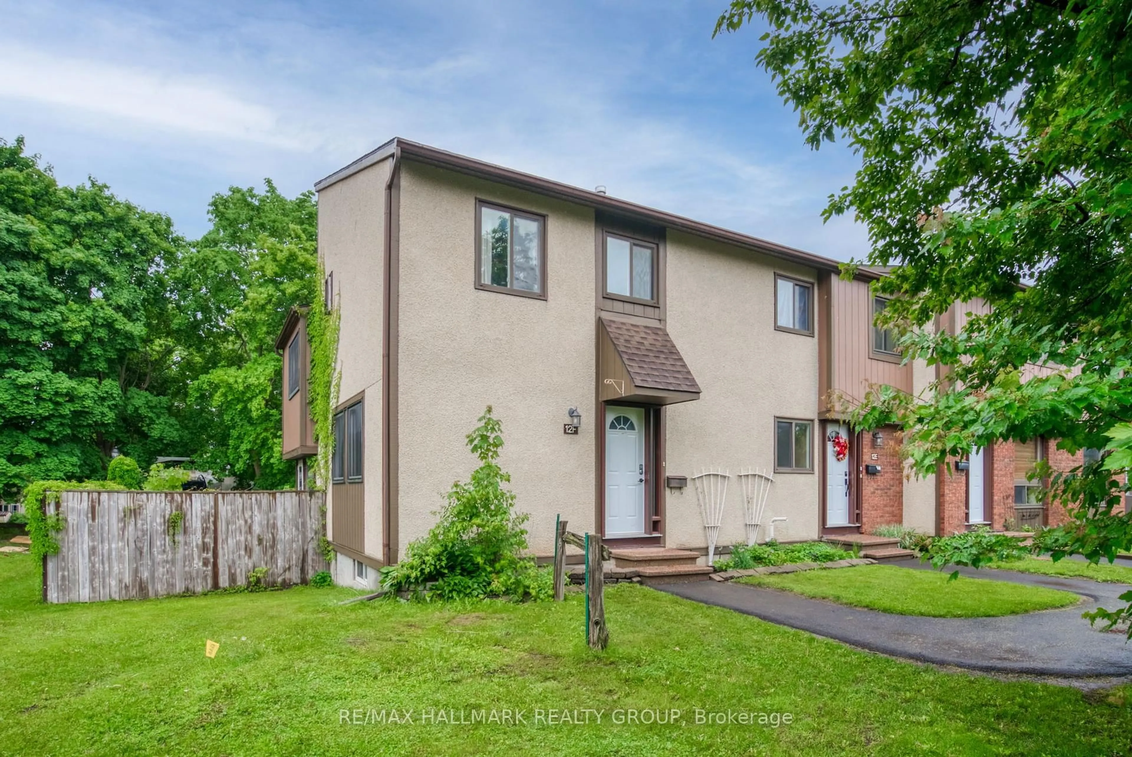 A pic from outside/outdoor area/front of a property/back of a property/a pic from drone, street for 12F Larkshire Lane, Ottawa Ontario K2J 1Y6