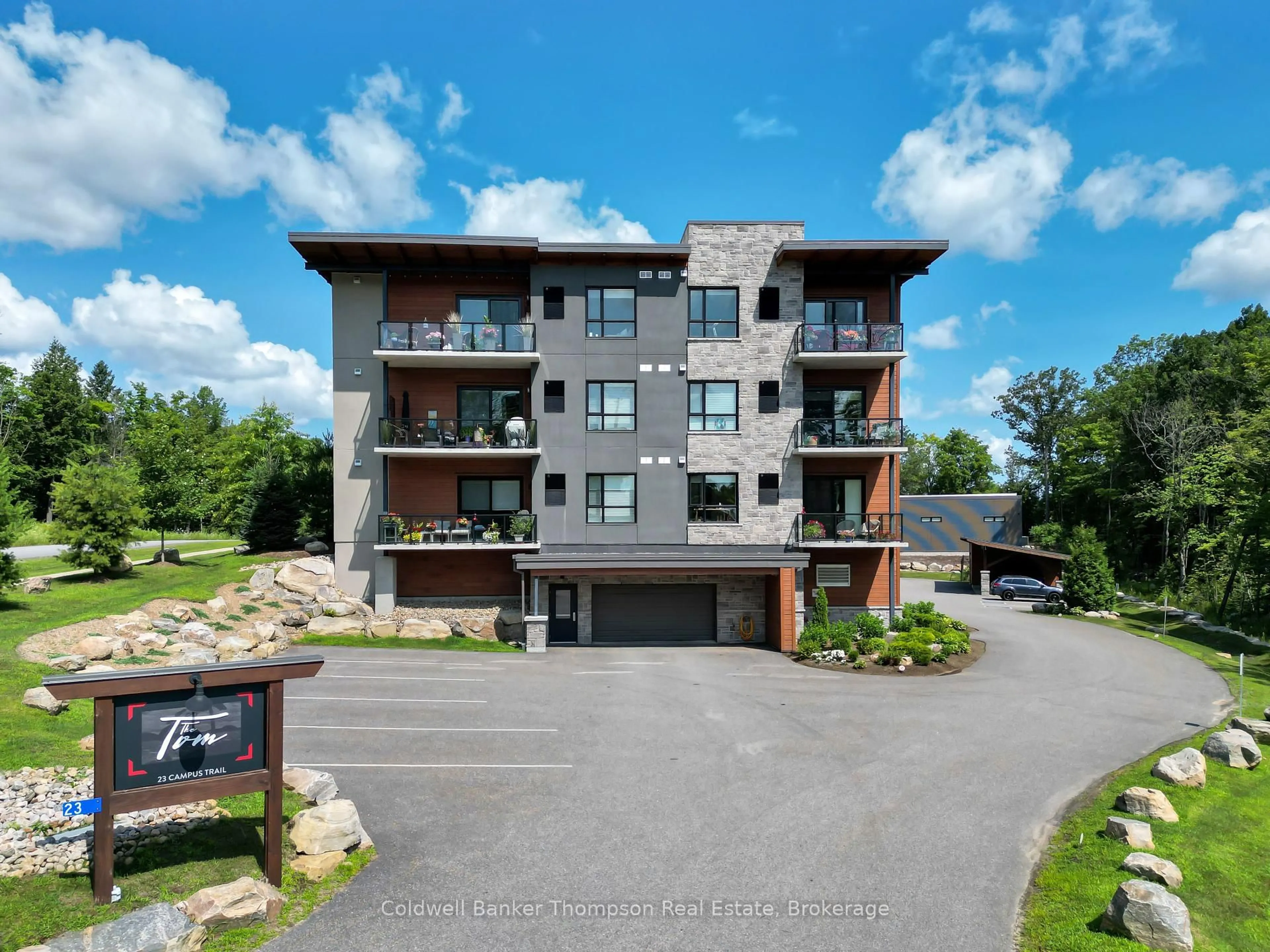 A pic from outside/outdoor area/front of a property/back of a property/a pic from drone, unknown for 23 Campus Tr #202, Huntsville Ontario P1H 0G1