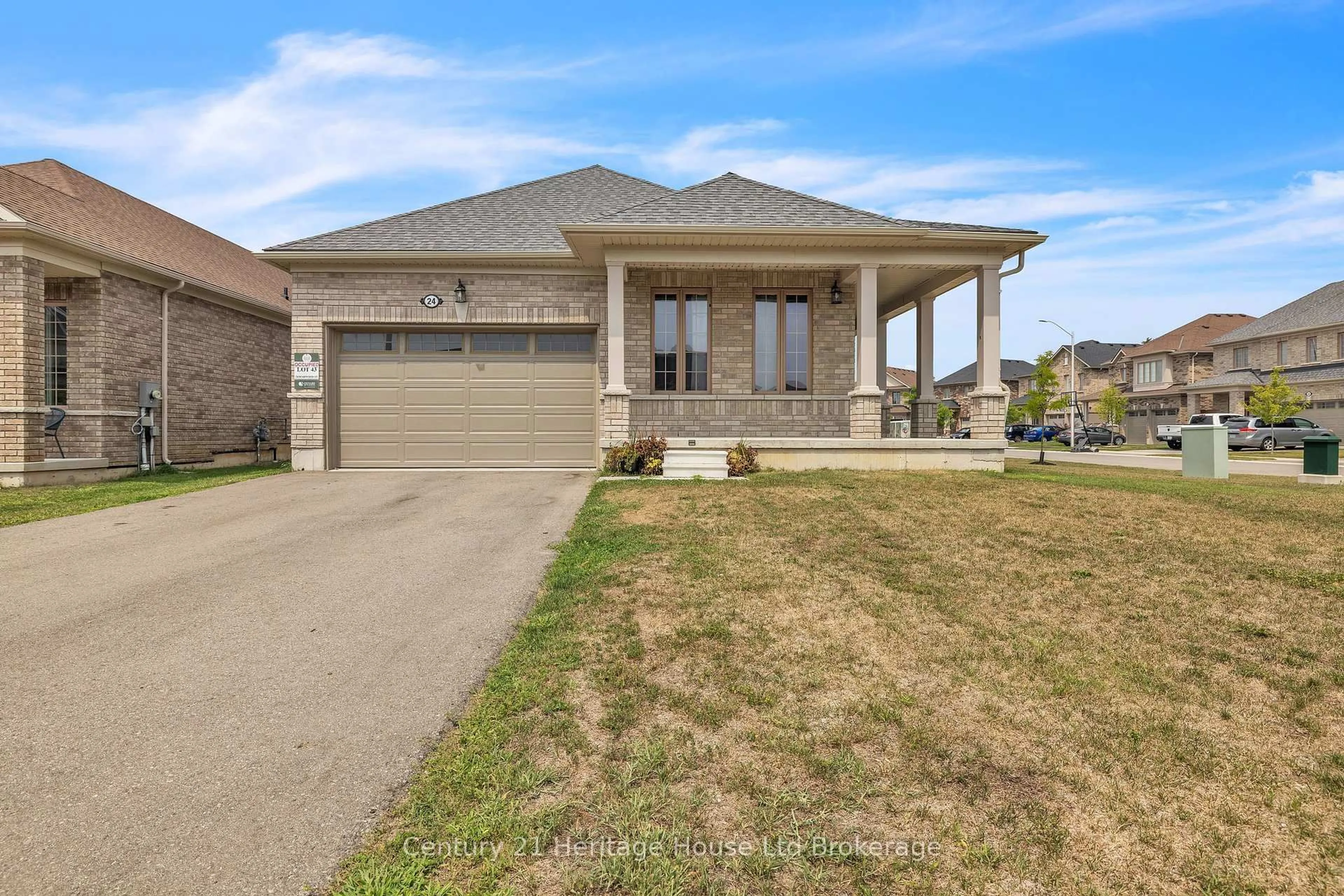 Home with brick exterior material, street for 24 HARWOOD St, Tillsonburg Ontario N4G 0J8