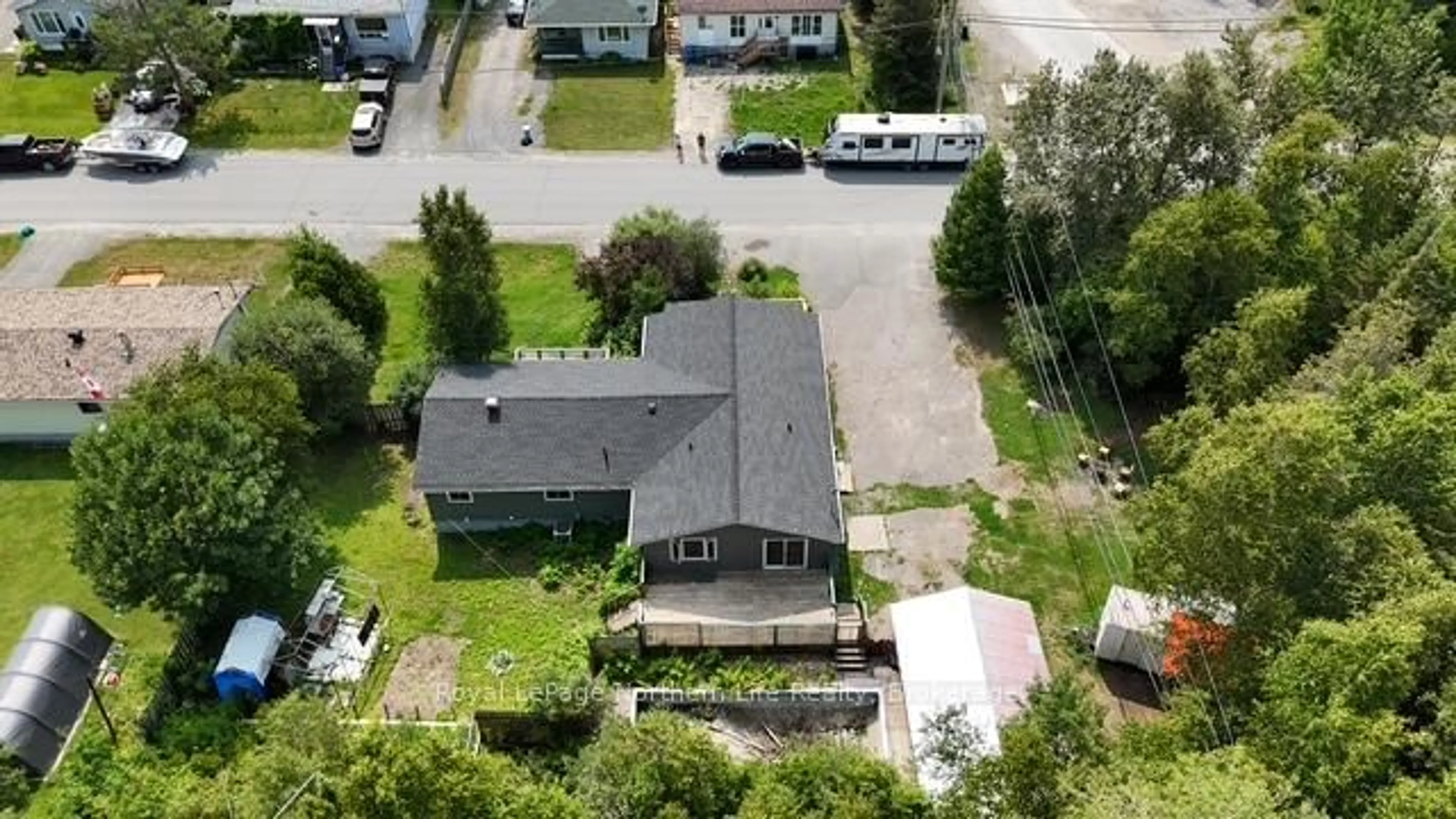 A pic from outside/outdoor area/front of a property/back of a property/a pic from drone, street for 24-26 Spruce Dr, Temagami Ontario P0H 2H0