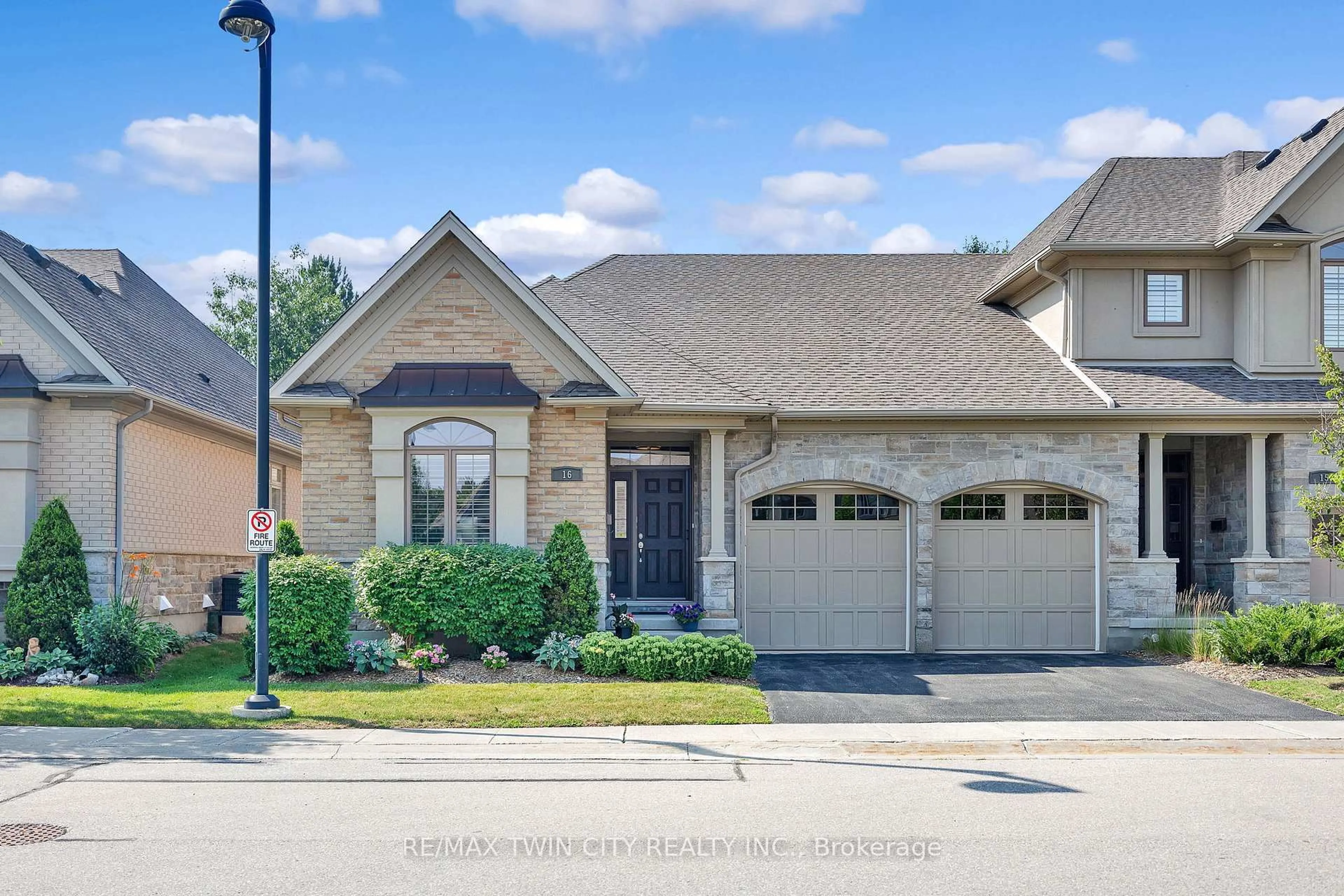 Home with brick exterior material, street for 435 Winchester Dr #16, Waterloo Ontario N2T 0B7