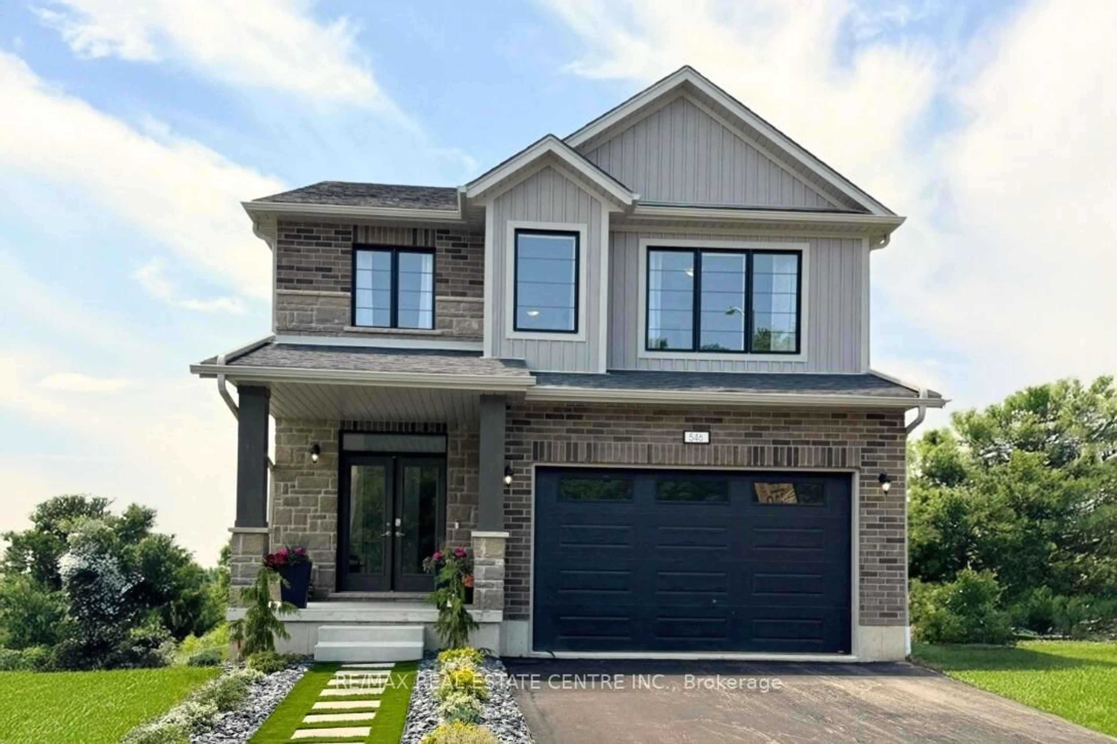 Home with brick exterior material, street for 546 Benninger Dr, Kitchener Ontario N2E 0C9