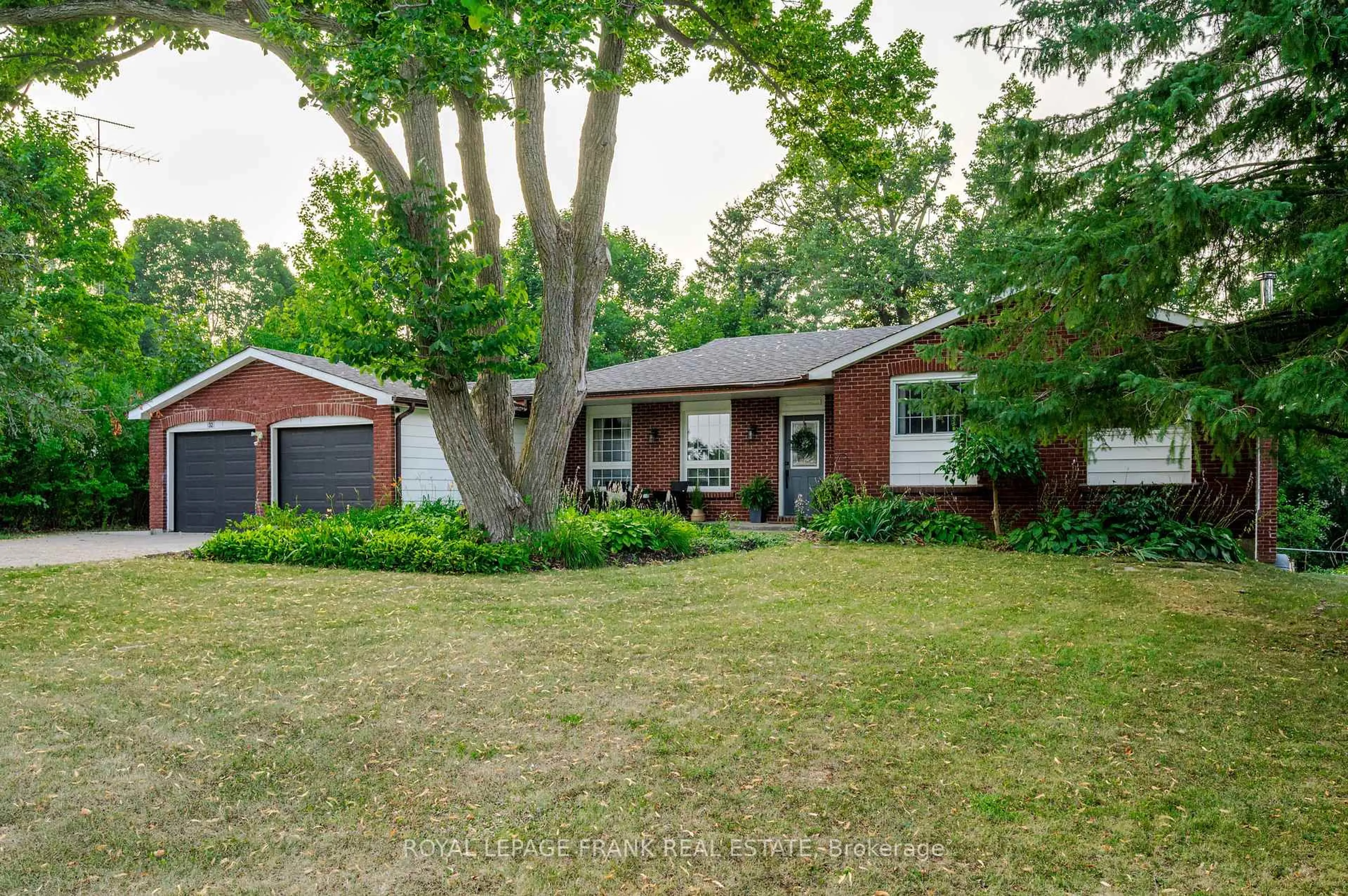Home with brick exterior material, street for 32 Crystal Springs Dr, Otonabee-South Monaghan Ontario K9J 6Y3