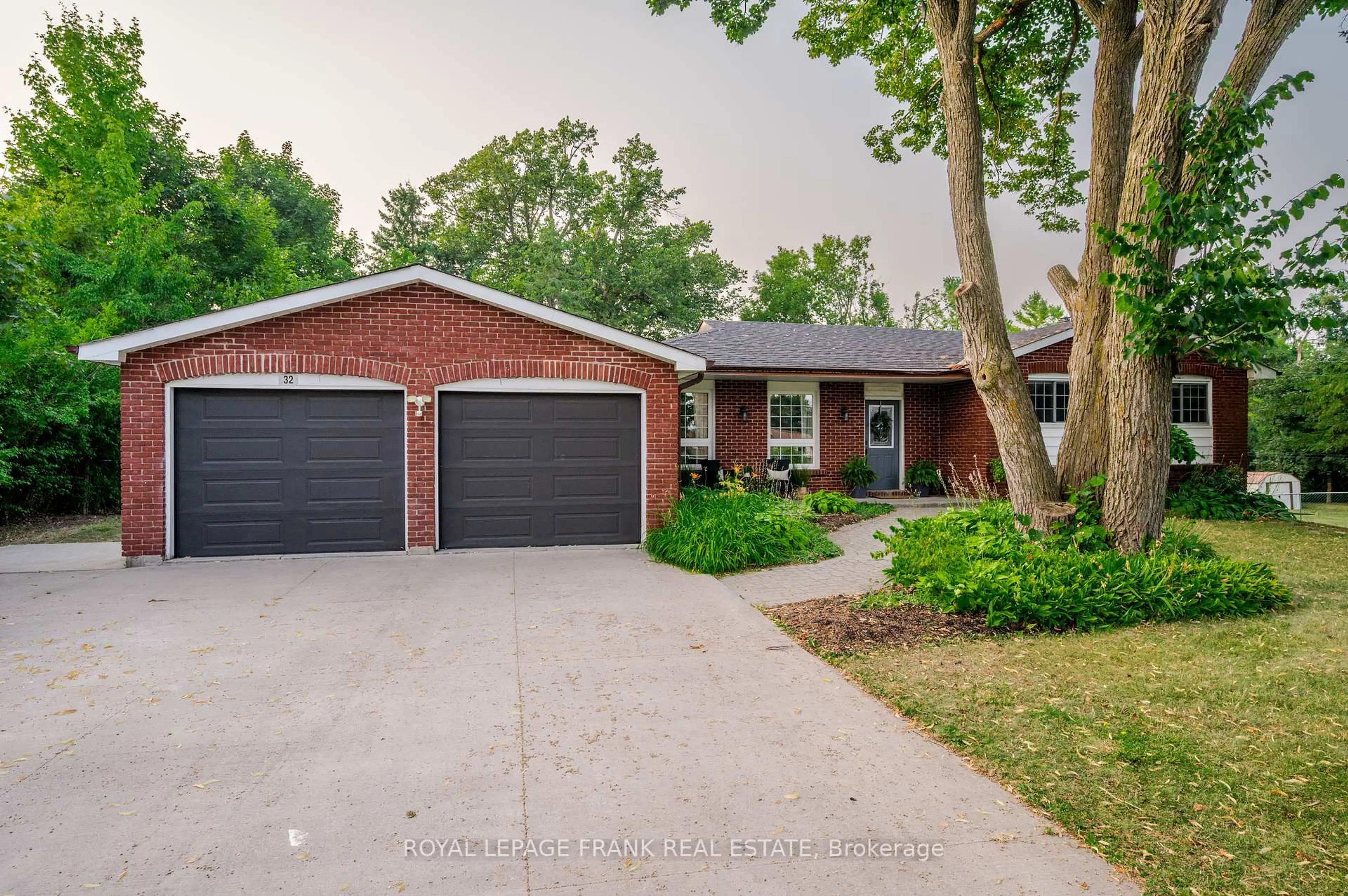 Home with brick exterior material, street for 32 Crystal Springs Dr, Otonabee-South Monaghan Ontario K9J 6Y3