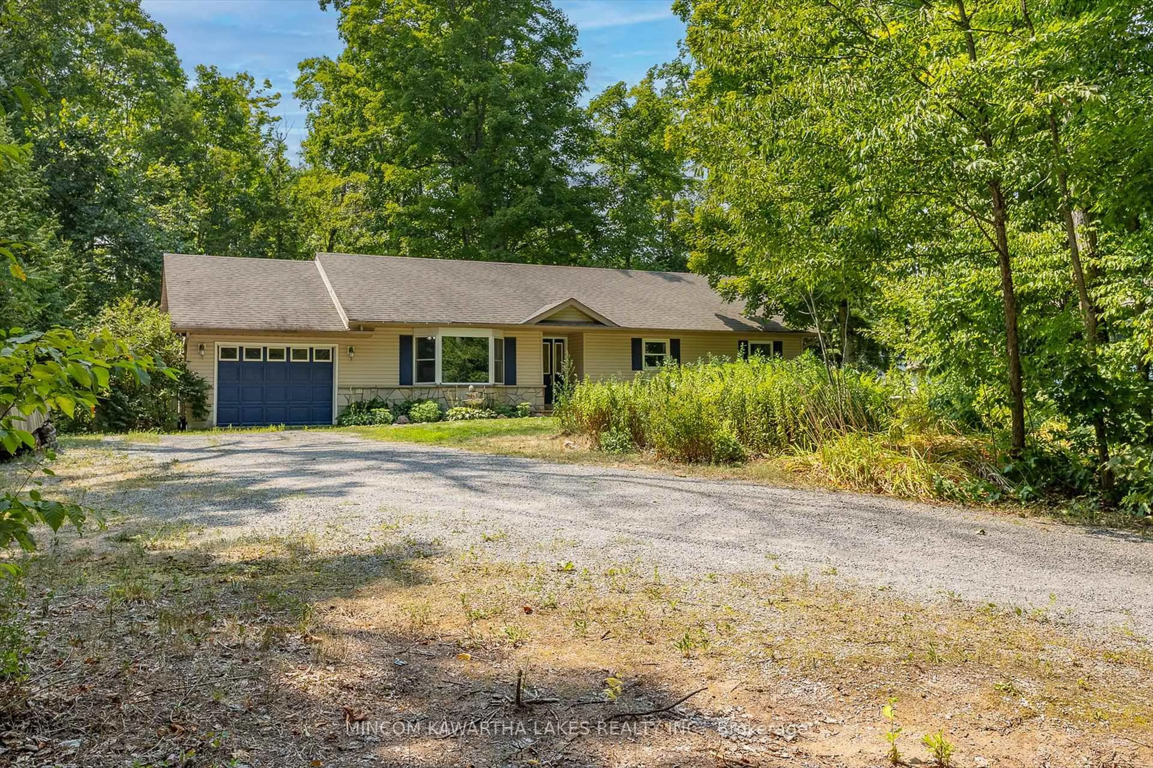A pic from outside/outdoor area/front of a property/back of a property/a pic from drone, street for 70 Sumcot Dr, Trent Lakes Ontario K9J 6X2