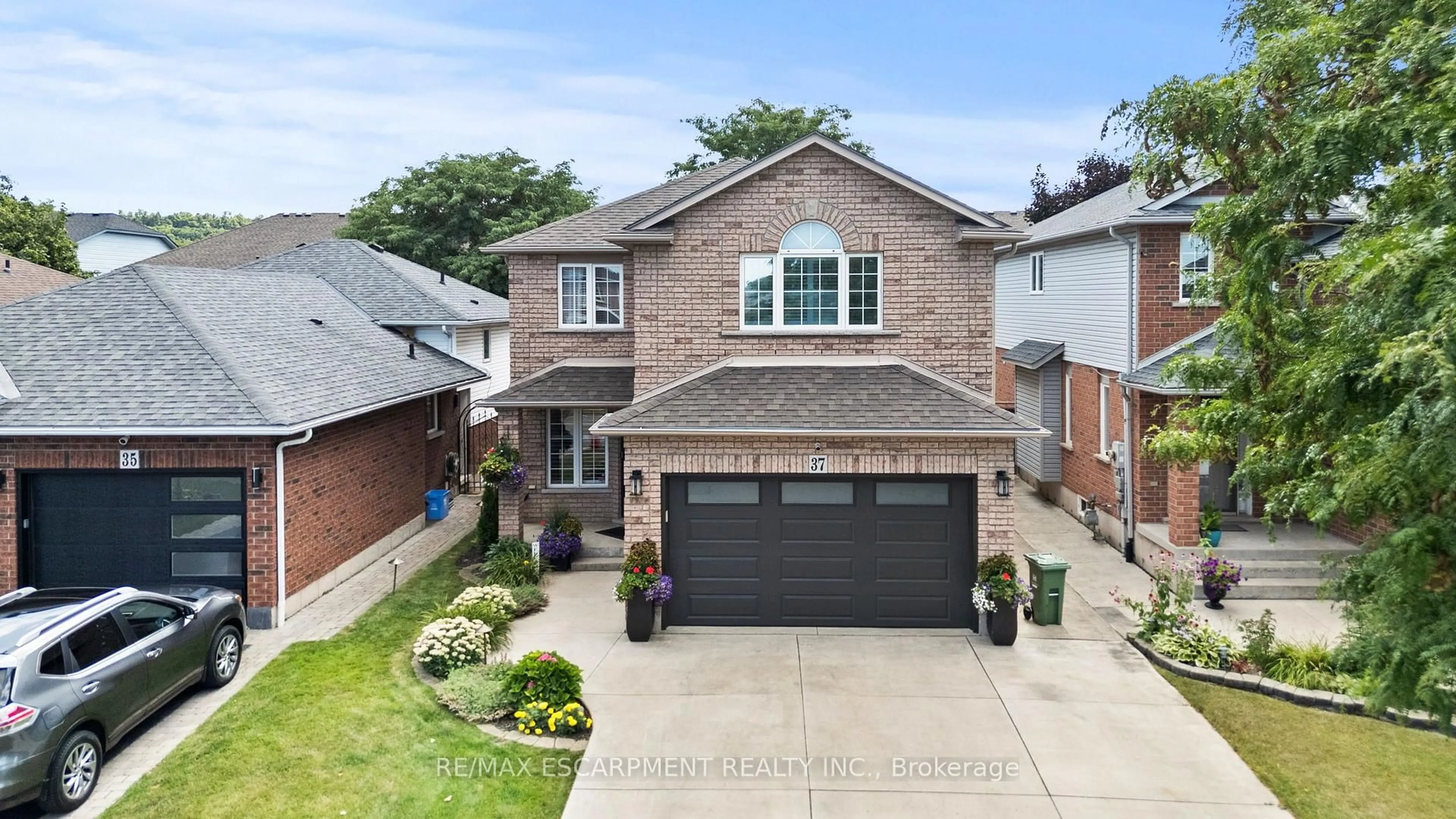 Home with brick exterior material, street for 37 Darrow Dr, Hamilton Ontario L8E 4P4