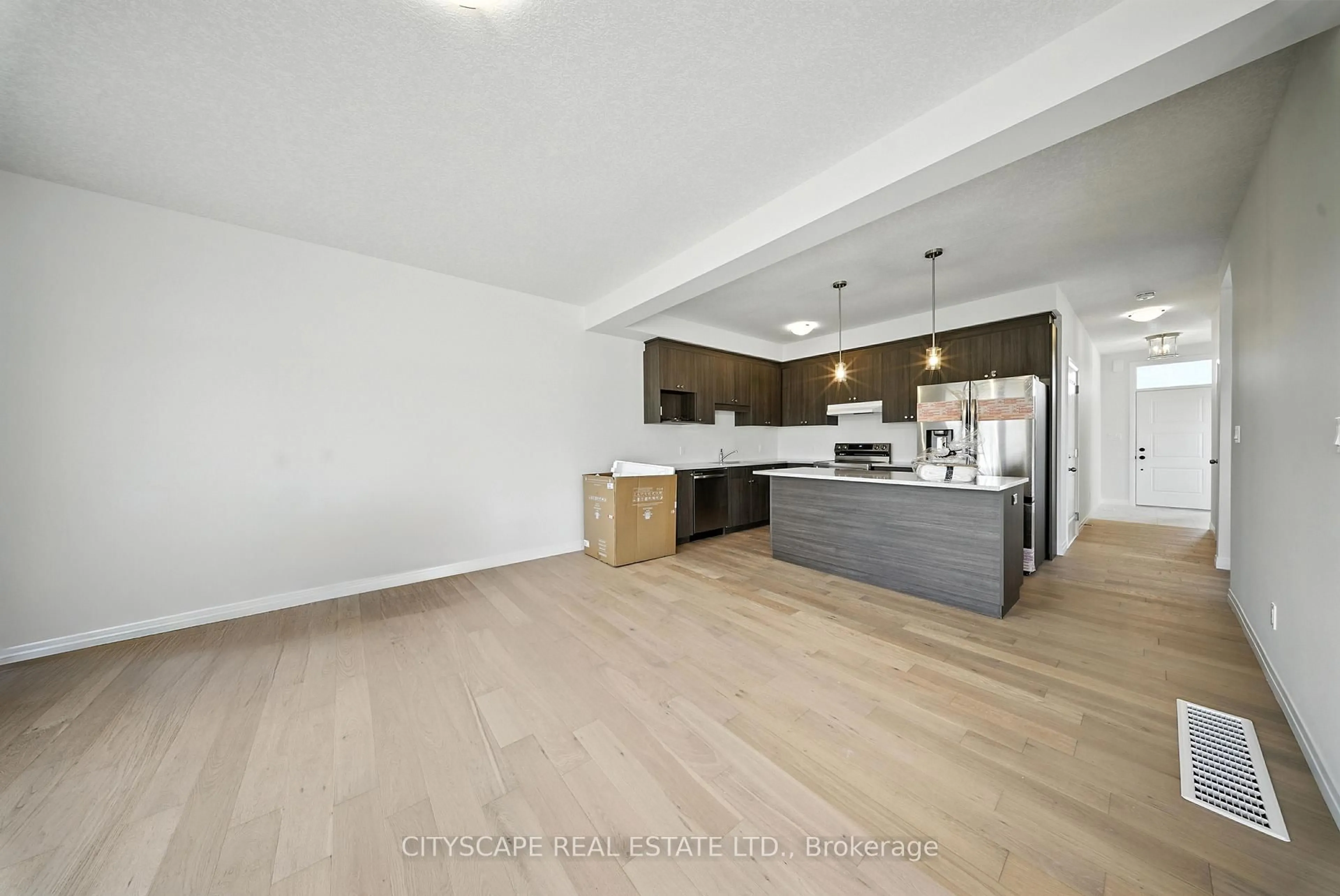 Open concept kitchen, wood/laminate floor for 39 Rivergreen Cres, Cambridge Ontario N1S 0G1