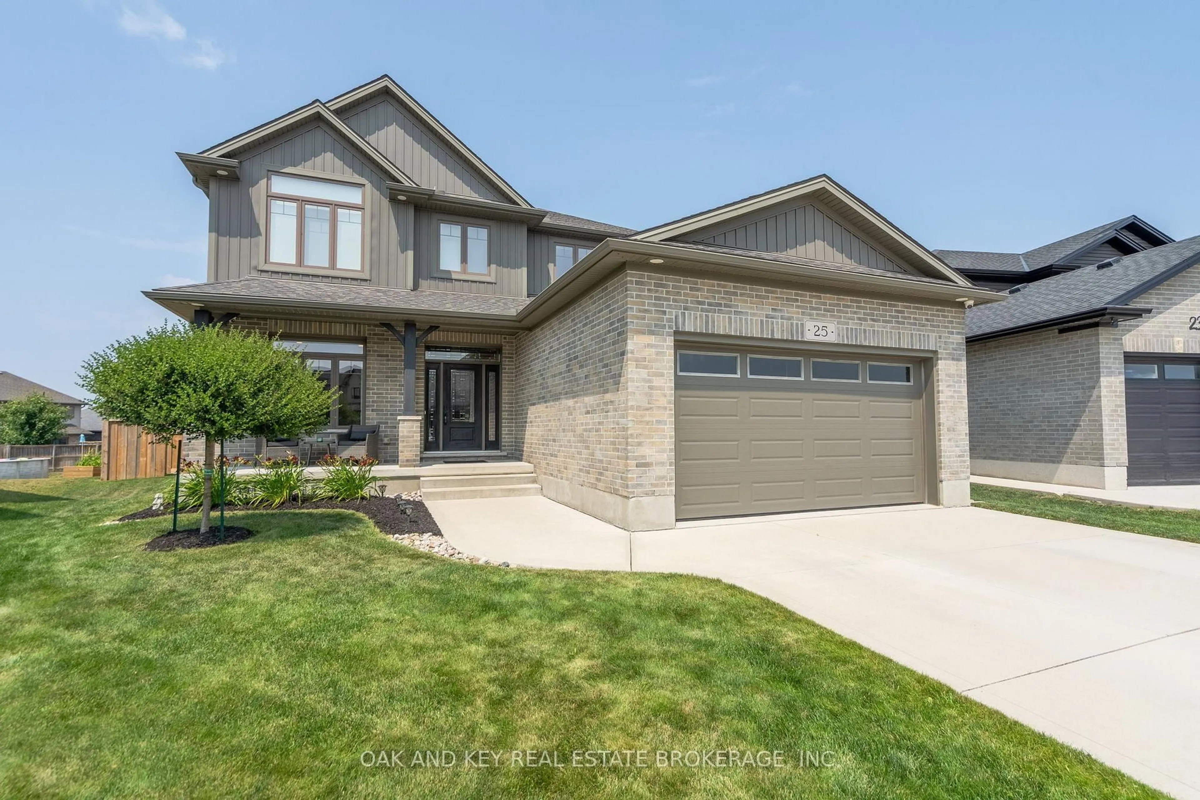 Home with brick exterior material, street for 25 Hardy Crt, Lucan Biddulph Ontario N0M 2J0