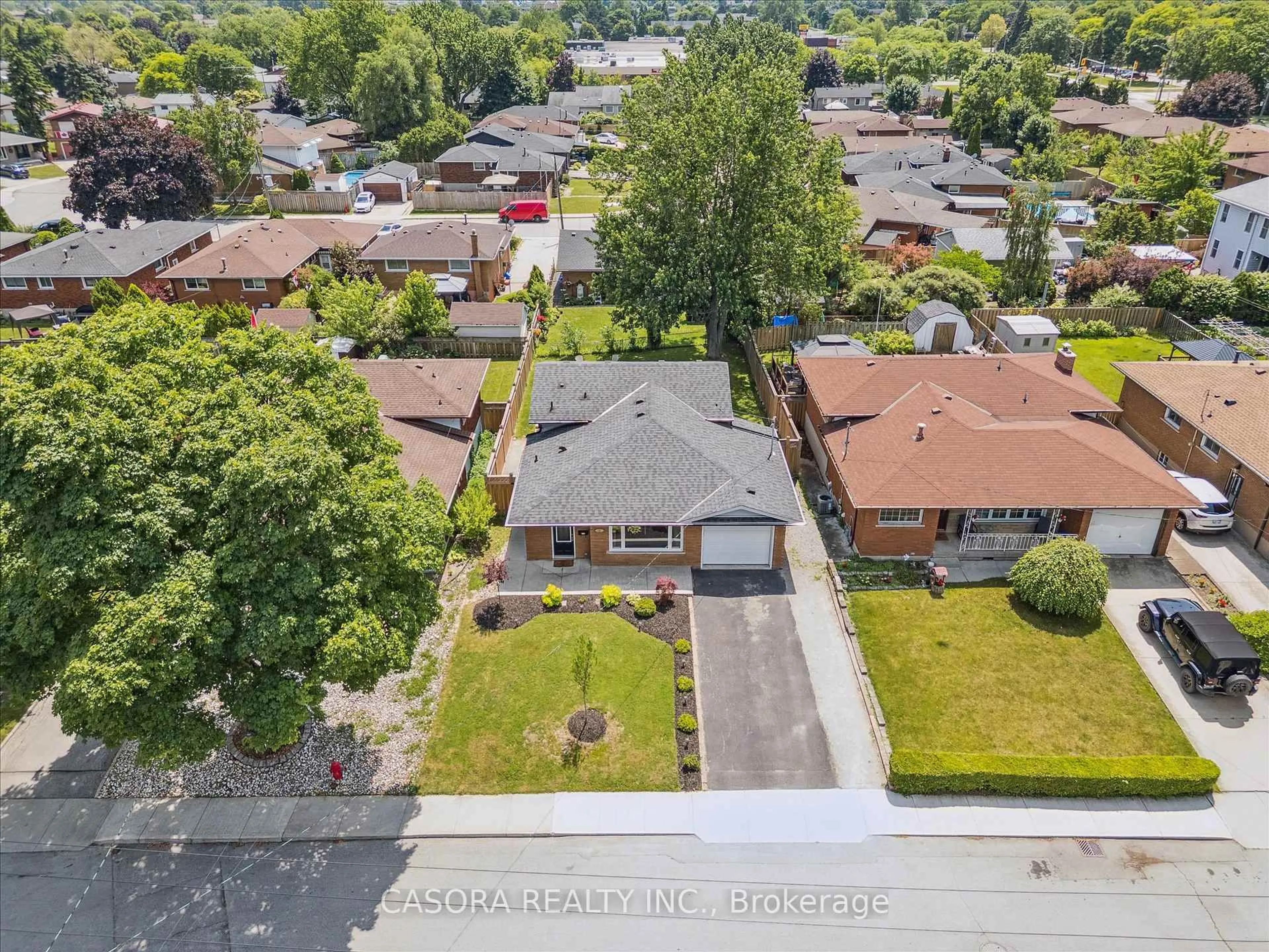 A pic from outside/outdoor area/front of a property/back of a property/a pic from drone, street for 12 Anson Ave, Hamilton Ontario L8T 2X3