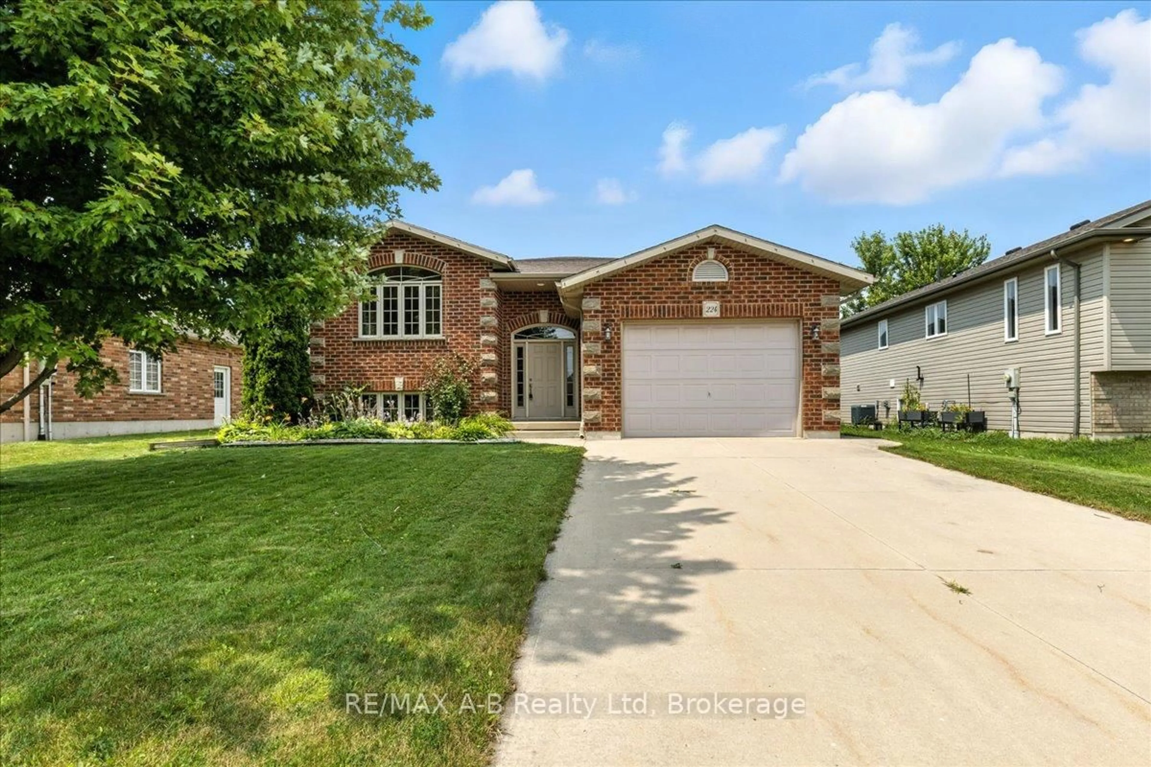 Home with brick exterior material, street for 224 Napier St, West Perth Ontario N0K 1N0