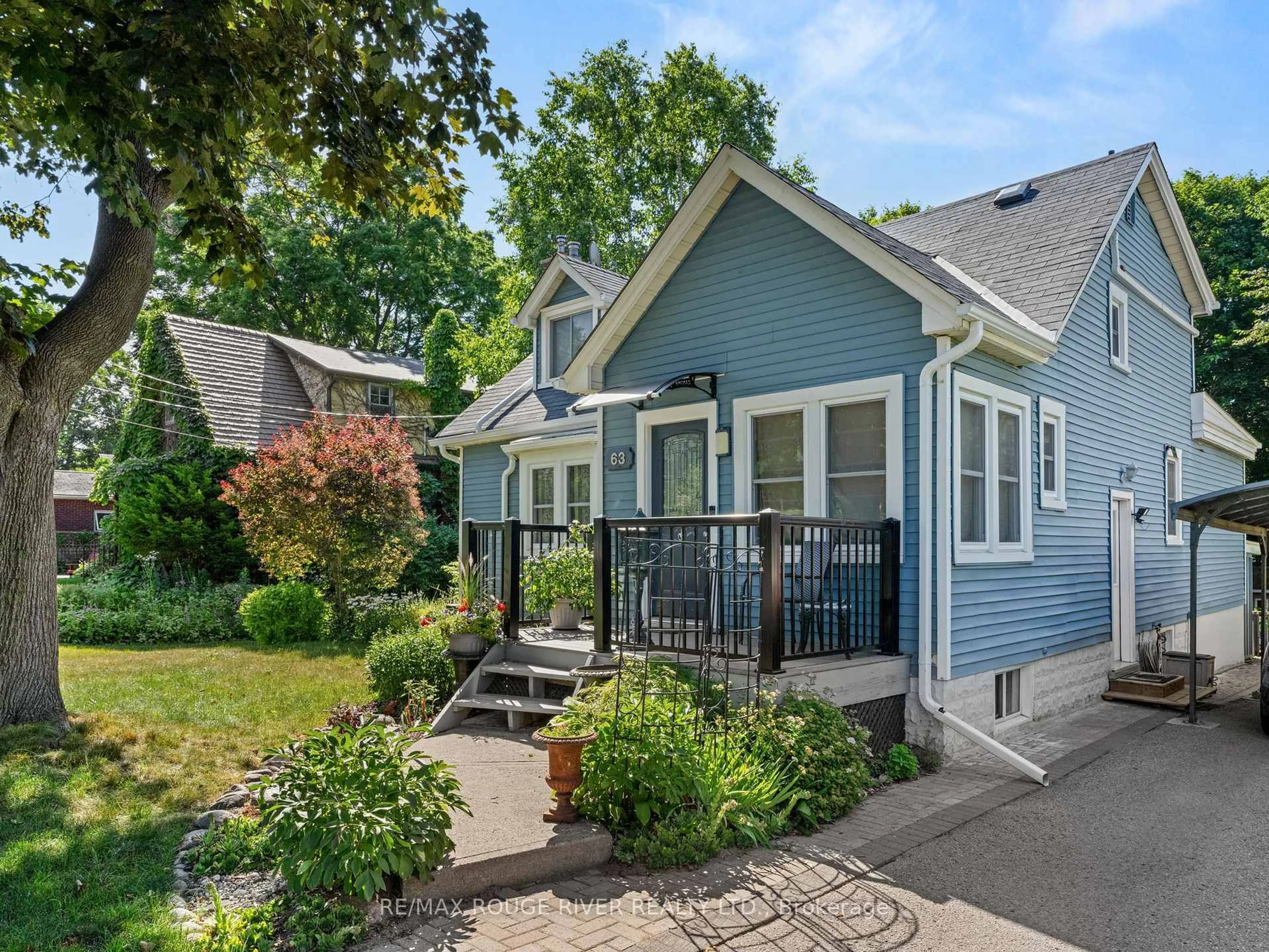 Home with vinyl exterior material, street for 63 University Ave, Cobourg Ontario K9A 1C9