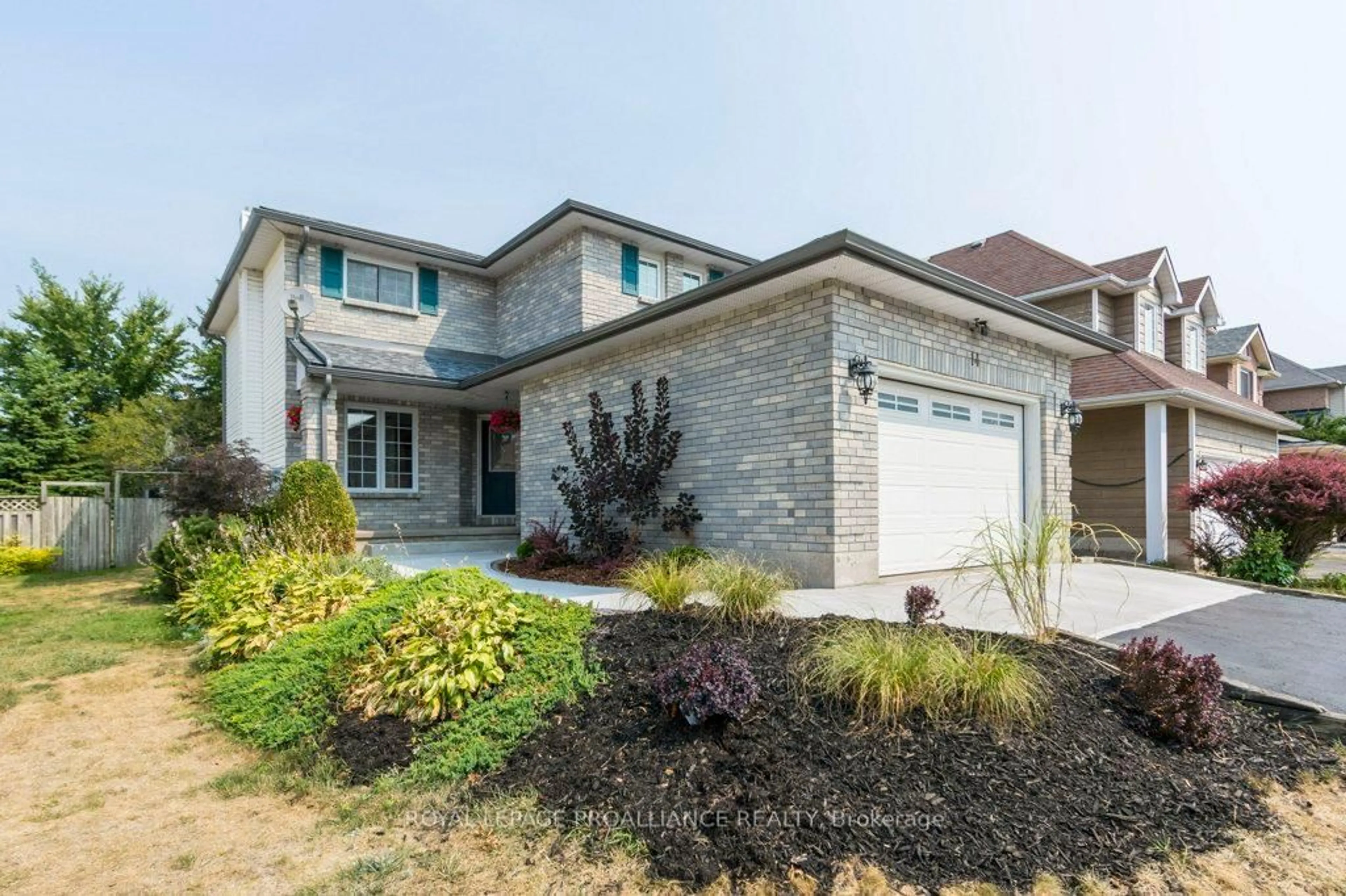 Home with brick exterior material, street for 14 Sherwood Cres, Belleville Ontario K8P 5G1