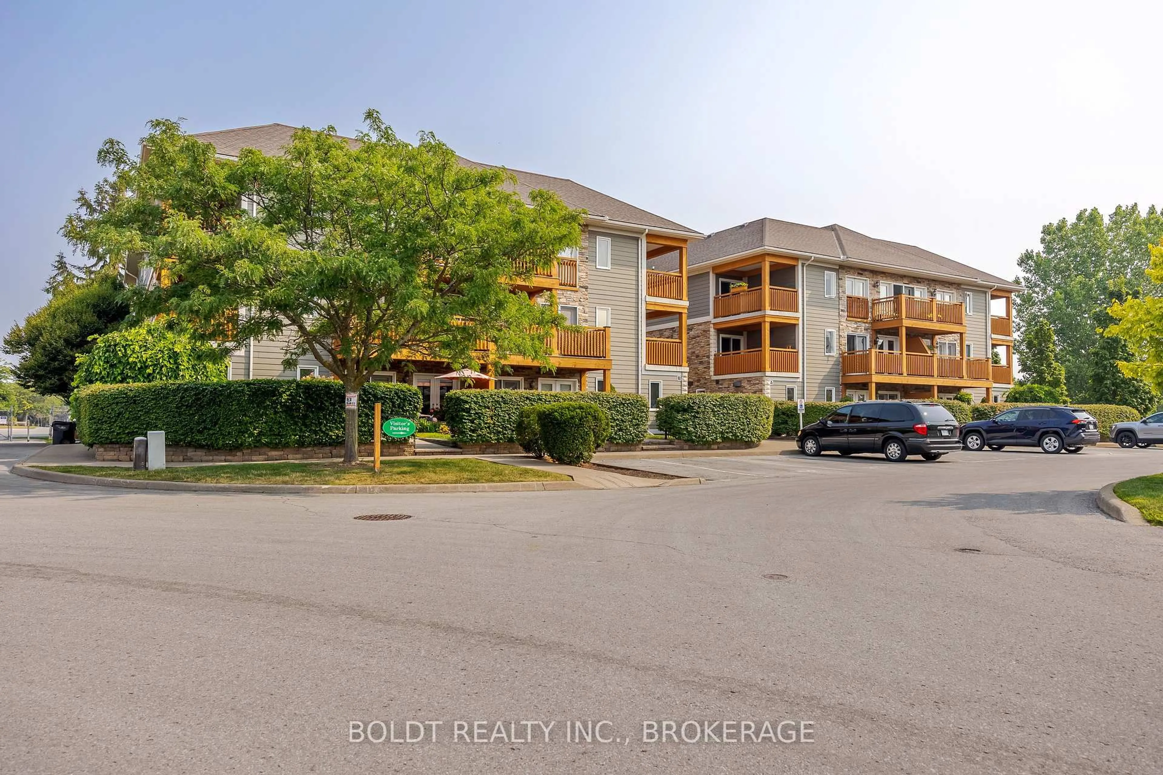 A pic from outside/outdoor area/front of a property/back of a property/a pic from drone, unknown for 678 LINE 2 Rd #201, Niagara-on-the-Lake Ontario L0S 1T0
