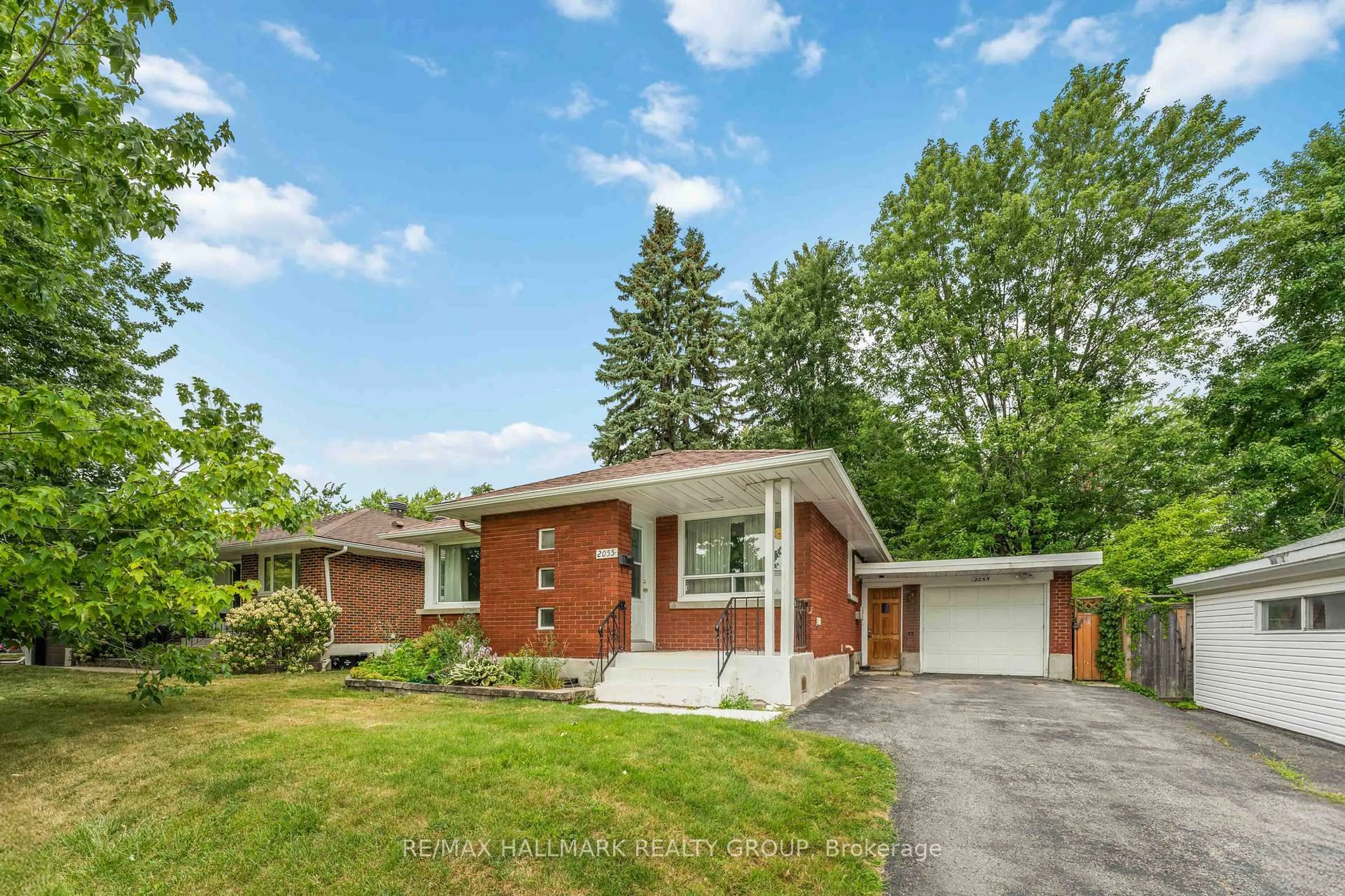 Home with brick exterior material, street for 2055 Neepawa Ave, Ottawa Ontario K2A 3L7