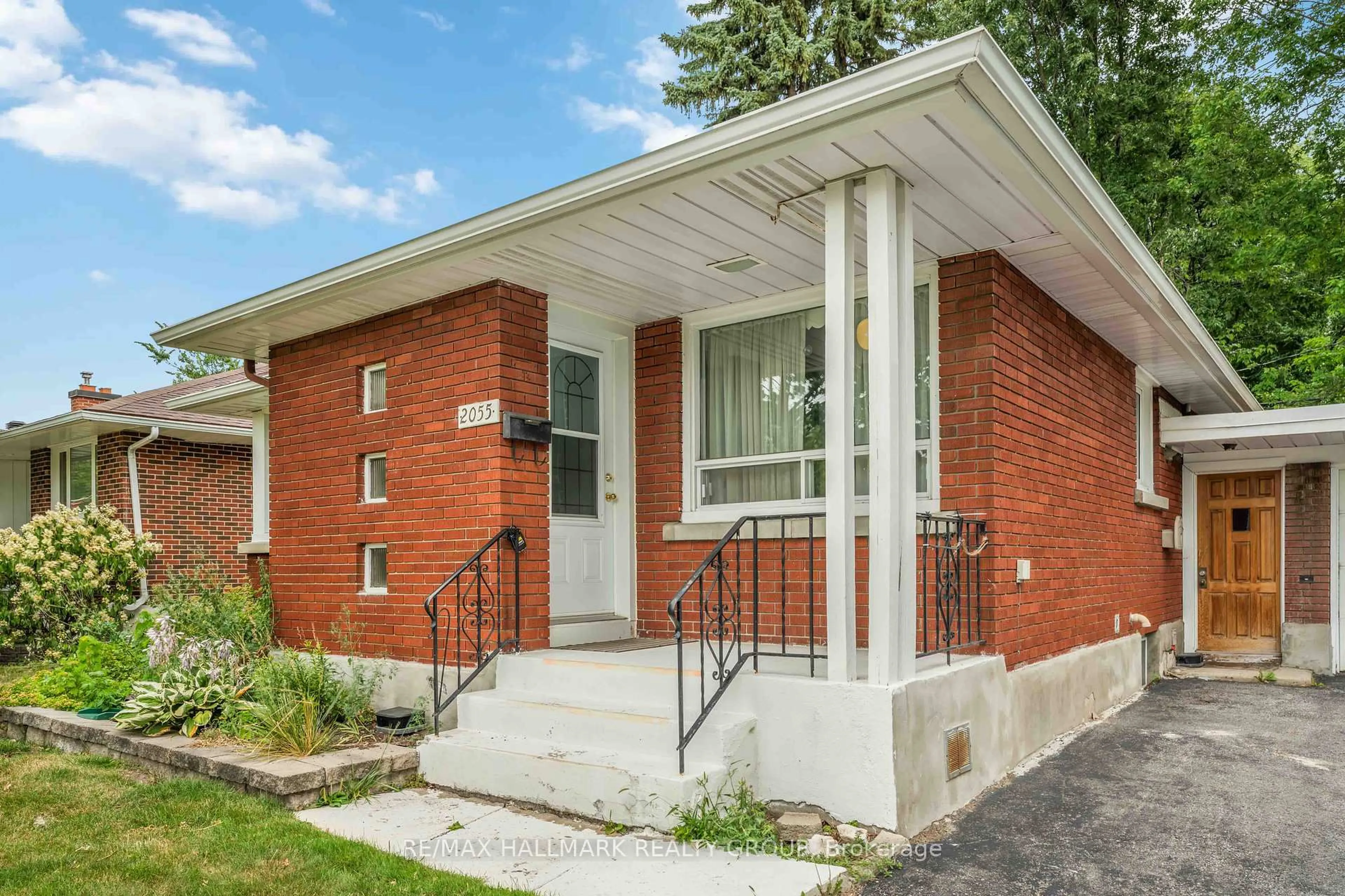 Home with brick exterior material, street for 2055 Neepawa Ave, Ottawa Ontario K2A 3L7