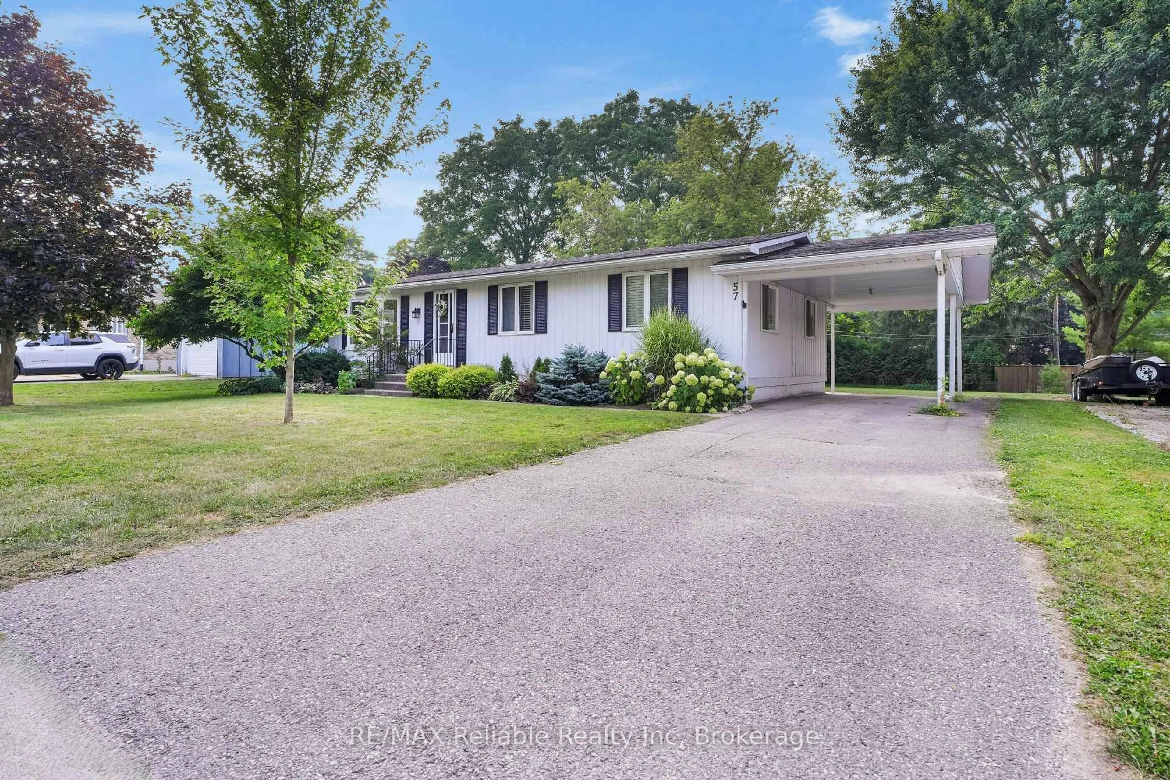 Home with vinyl exterior material, street for 57 Coleman St, Huron East Ontario N0K 1W0