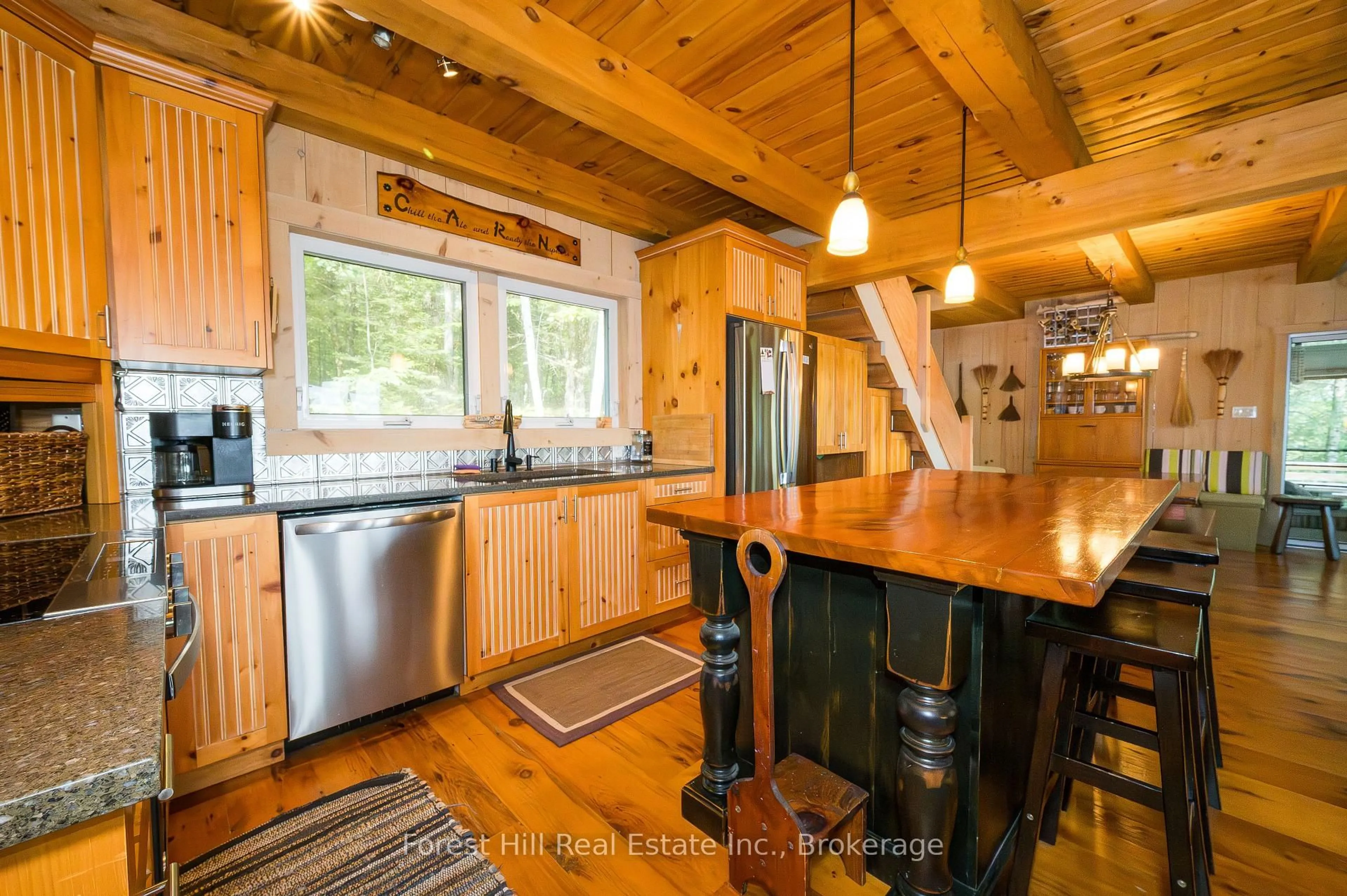 Open concept kitchen, wood/laminate floor for 1224 Moot Lake Rd, Lake of Bays Ontario P0B 0A3