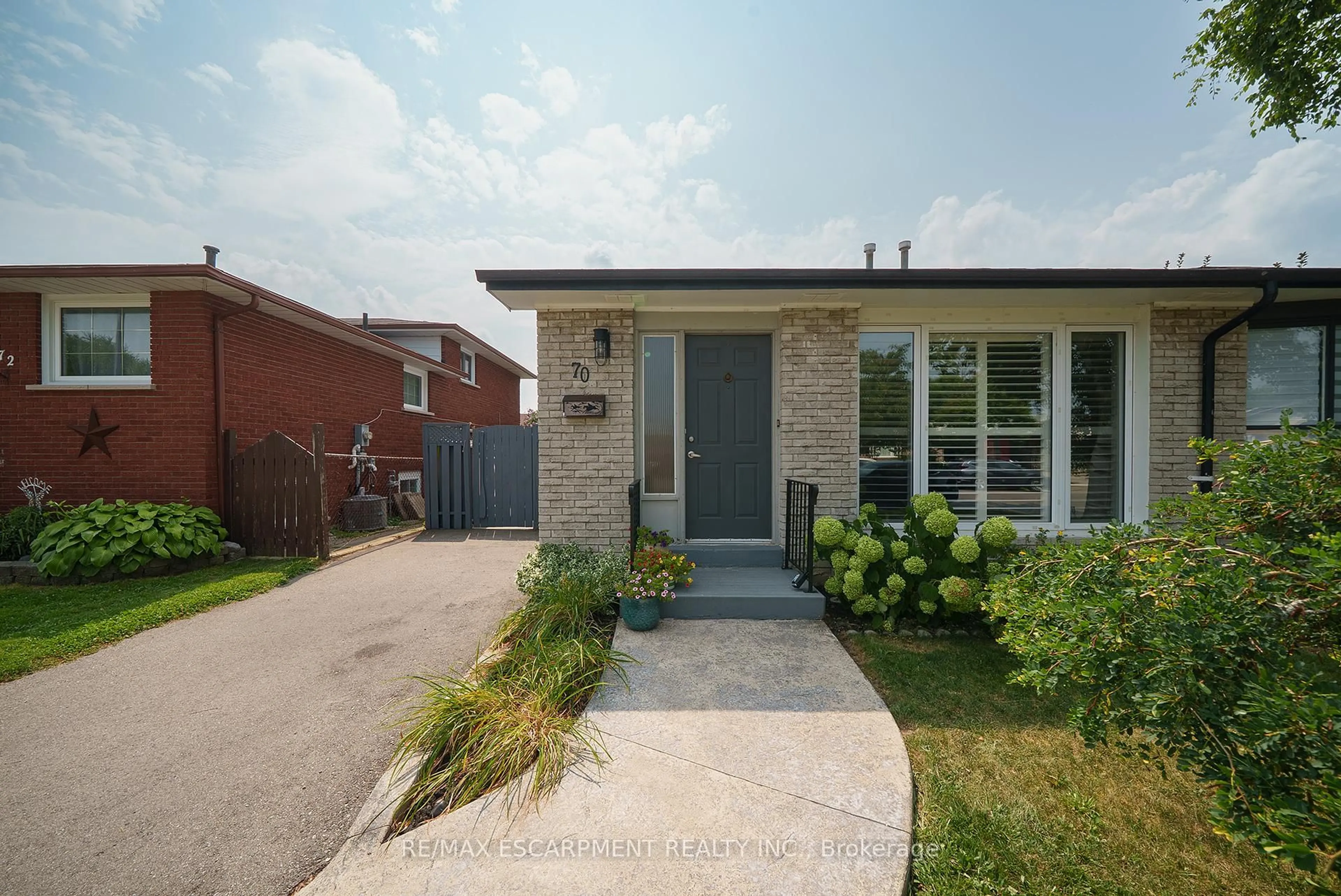 Home with brick exterior material, street for 70 Four Seasons Dr, Brantford Ontario N3R 7B3