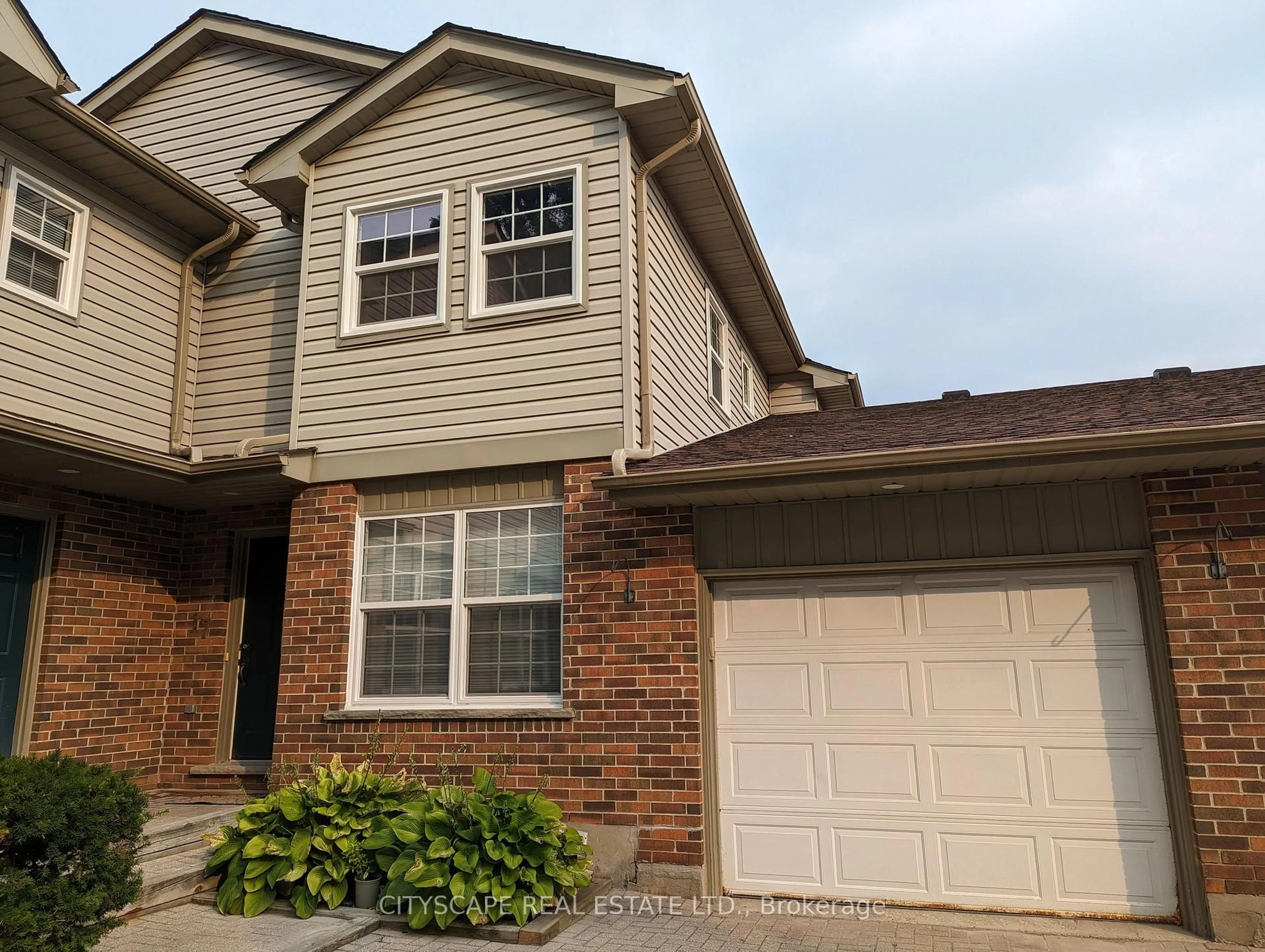 Home with vinyl exterior material, street for 250 Keats Way #17, Waterloo Ontario N2L 6J5